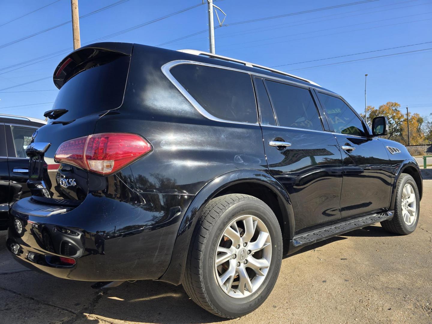 2012 BLACK Infiniti QX56 4WD (JN8AZ2NE7C9) with an 5.6L V8 DOHC 32V engine, 5-Speed Automatic transmission, located at 2660 S.Garland Avenue, Garland, TX, 75041, (469) 298-3118, 32.885551, -96.655602 - Photo#3