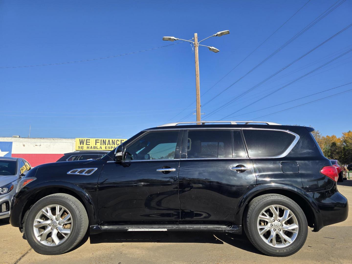 2012 BLACK Infiniti QX56 4WD (JN8AZ2NE7C9) with an 5.6L V8 DOHC 32V engine, 5-Speed Automatic transmission, located at 2660 S.Garland Avenue, Garland, TX, 75041, (469) 298-3118, 32.885551, -96.655602 - Photo#6
