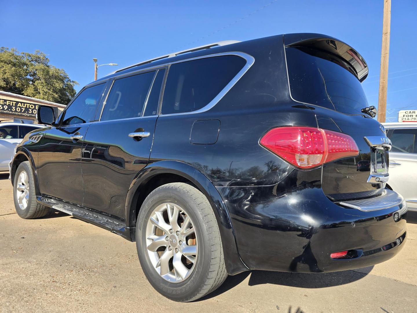 2012 BLACK Infiniti QX56 4WD (JN8AZ2NE7C9) with an 5.6L V8 DOHC 32V engine, 5-Speed Automatic transmission, located at 2660 S.Garland Avenue, Garland, TX, 75041, (469) 298-3118, 32.885551, -96.655602 - Photo#5