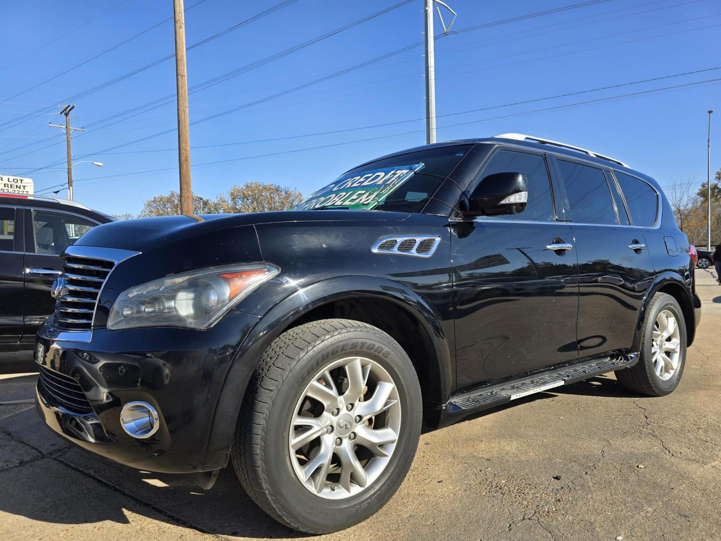 2012 BLACK Infiniti QX56 4WD (JN8AZ2NE7C9) with an 5.6L V8 DOHC 32V engine, 5-Speed Automatic transmission, located at 2660 S.Garland Avenue, Garland, TX, 75041, (469) 298-3118, 32.885551, -96.655602 - Photo#7