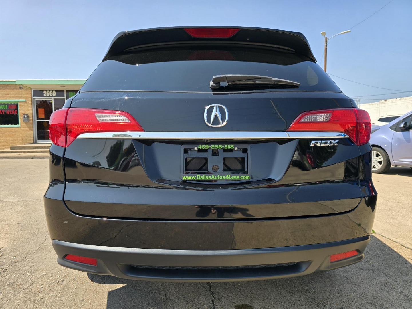 2013 BLACK Acura RDX Technology Package (5J8TB3H55DL) with an 2.3L L4 DOHC 16V engine, 6-Speed Automatic transmission, located at 2660 S.Garland Avenue, Garland, TX, 75041, (469) 298-3118, 32.885551, -96.655602 - Welcome to DallasAutos4Less, one of the Premier BUY HERE PAY HERE Dealers in the North Dallas Area. We specialize in financing to people with NO CREDIT or BAD CREDIT. We need proof of income, proof of residence, and a ID. Come buy your new car from us today!! This is a very well cared for 2013 AC - Photo#4
