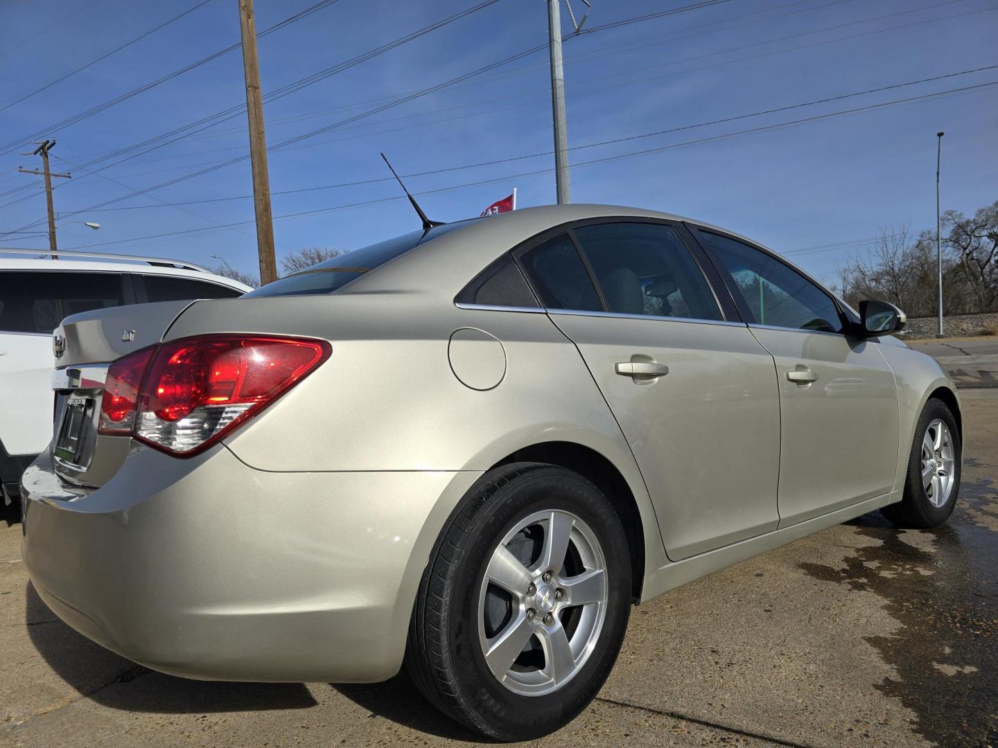 2013 GOLD Chevrolet Cruze 1LT (1G1PC5SB3D7) with an 1.4L L4 DOHC 16V TURBO engine, 6-Speed Automatic transmission, located at 2660 S.Garland Avenue, Garland, TX, 75041, (469) 298-3118, 32.885551, -96.655602 - CASH$$$$$ CAR!!! Call us with any questions at 469-306-4826, or email us DallasAutos4Less@gmail.com. - Photo#3