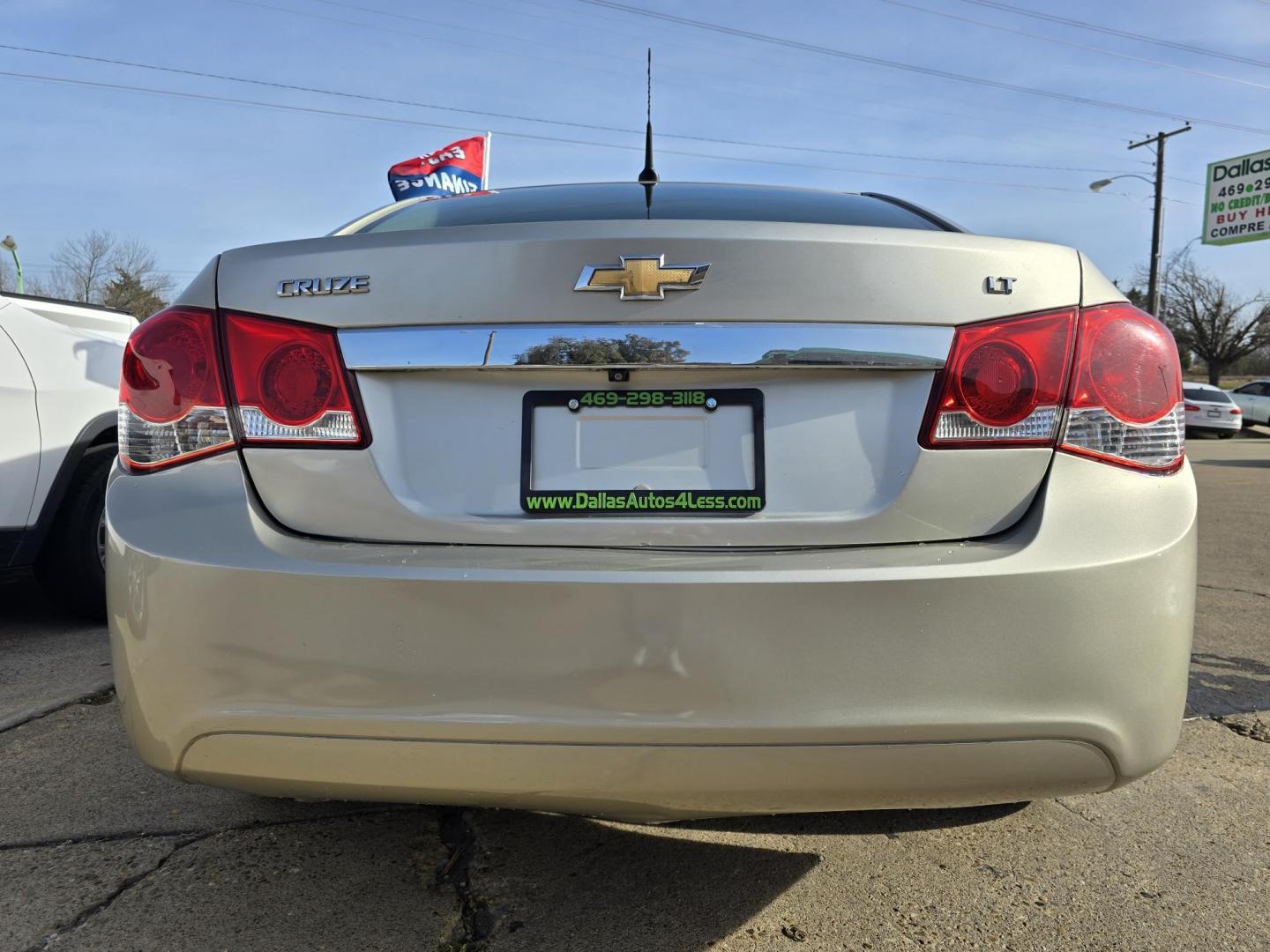 2013 GOLD Chevrolet Cruze 1LT (1G1PC5SB3D7) with an 1.4L L4 DOHC 16V TURBO engine, 6-Speed Automatic transmission, located at 2660 S.Garland Avenue, Garland, TX, 75041, (469) 298-3118, 32.885551, -96.655602 - CASH$$$$$ CAR!!! Call us with any questions at 469-306-4826, or email us DallasAutos4Less@gmail.com. - Photo#4