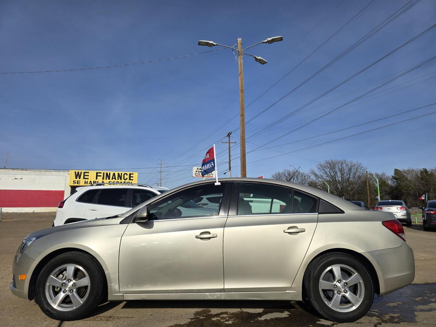 2013 GOLD Chevrolet Cruze 1LT (1G1PC5SB3D7) with an 1.4L L4 DOHC 16V TURBO engine, 6-Speed Automatic transmission, located at 2660 S.Garland Avenue, Garland, TX, 75041, (469) 298-3118, 32.885551, -96.655602 - CASH$$$$$ CAR!!! Call us with any questions at 469-306-4826, or email us DallasAutos4Less@gmail.com. - Photo#6
