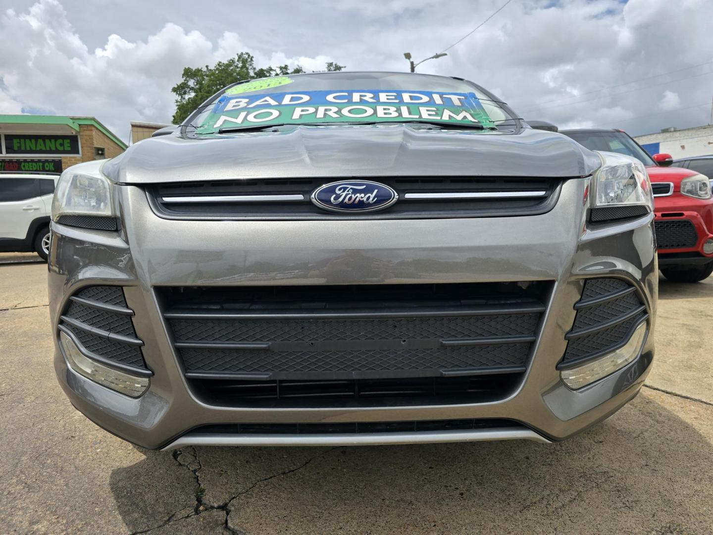 2013 GRAY Ford Escape SE (1FMCU9GX0DU) with an 1.6L L4 DOHC 16V engine, 6-Speed Automatic transmission, located at 2660 S.Garland Avenue, Garland, TX, 75041, (469) 298-3118, 32.885551, -96.655602 - Welcome to DallasAutos4Less, one of the Premier BUY HERE PAY HERE Dealers in the North Dallas Area. We specialize in financing to people with NO CREDIT or BAD CREDIT. We need proof of income, proof of residence, and a ID. Come buy your new car from us today!! This is a Super Clean 2013 FORD ESCAP - Photo#9