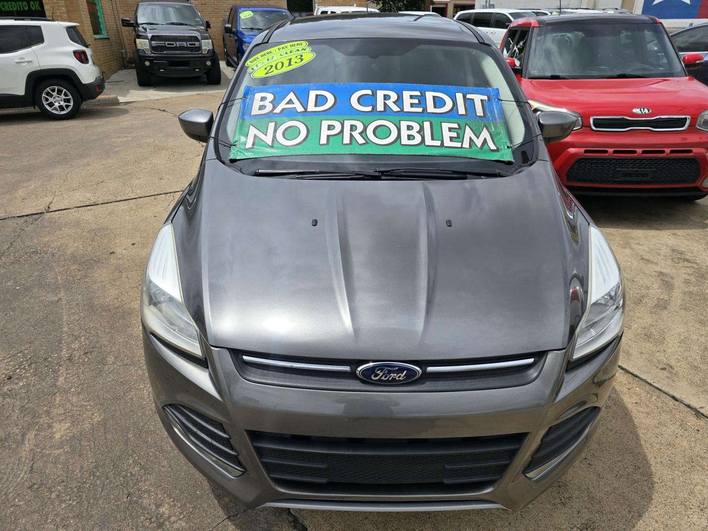 2013 GRAY Ford Escape SE (1FMCU9GX0DU) with an 1.6L L4 DOHC 16V engine, 6-Speed Automatic transmission, located at 2660 S.Garland Avenue, Garland, TX, 75041, (469) 298-3118, 32.885551, -96.655602 - Welcome to DallasAutos4Less, one of the Premier BUY HERE PAY HERE Dealers in the North Dallas Area. We specialize in financing to people with NO CREDIT or BAD CREDIT. We need proof of income, proof of residence, and a ID. Come buy your new car from us today!! This is a Super Clean 2013 FORD ESCAP - Photo#8