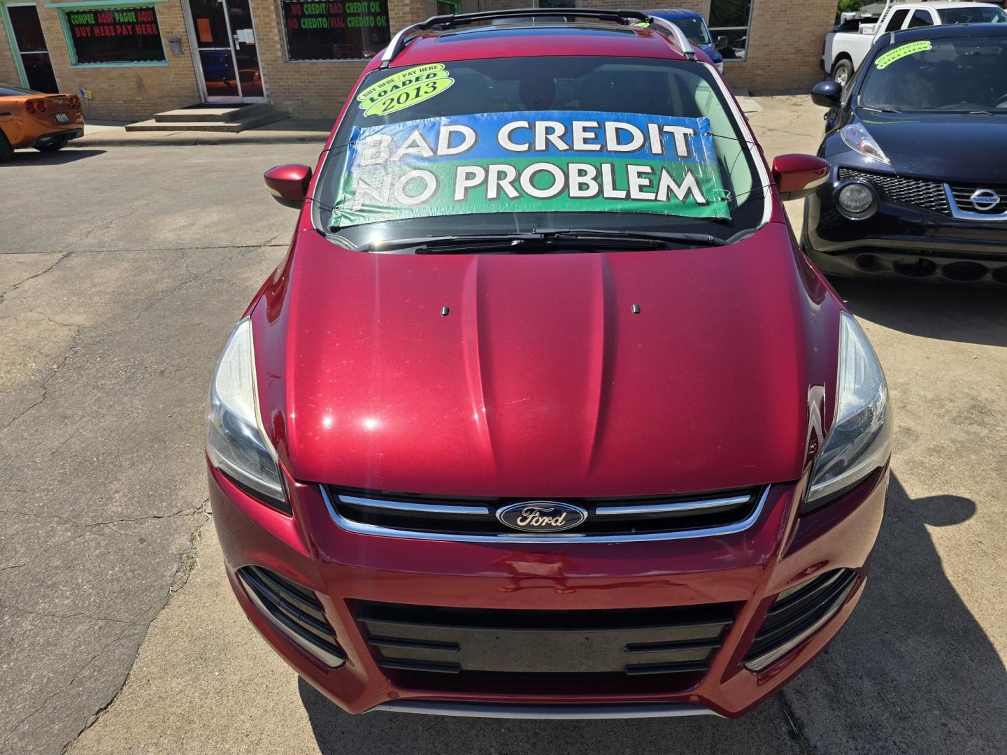 2013 RED Ford Escape Titanium (1FMCU0J93DU) with an 2.0L L4 DOHC 16V engine, 6-Speed Automatic transmission, located at 2660 S.Garland Avenue, Garland, TX, 75041, (469) 298-3118, 32.885551, -96.655602 - Welcome to DallasAutos4Less, one of the Premier BUY HERE PAY HERE Dealers in the North Dallas Area. We specialize in financing to people with NO CREDIT or BAD CREDIT. We need proof of income, proof of residence, and a ID. Come buy your new car from us today!! This is a Super Clean 2013 FORD ESCAP - Photo#8