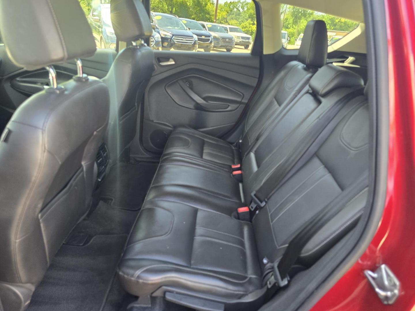 2013 RED Ford Escape Titanium (1FMCU0J93DU) with an 2.0L L4 DOHC 16V engine, 6-Speed Automatic transmission, located at 2660 S.Garland Avenue, Garland, TX, 75041, (469) 298-3118, 32.885551, -96.655602 - Welcome to DallasAutos4Less, one of the Premier BUY HERE PAY HERE Dealers in the North Dallas Area. We specialize in financing to people with NO CREDIT or BAD CREDIT. We need proof of income, proof of residence, and a ID. Come buy your new car from us today!! This is a Super Clean 2013 FORD ESCAP - Photo#18