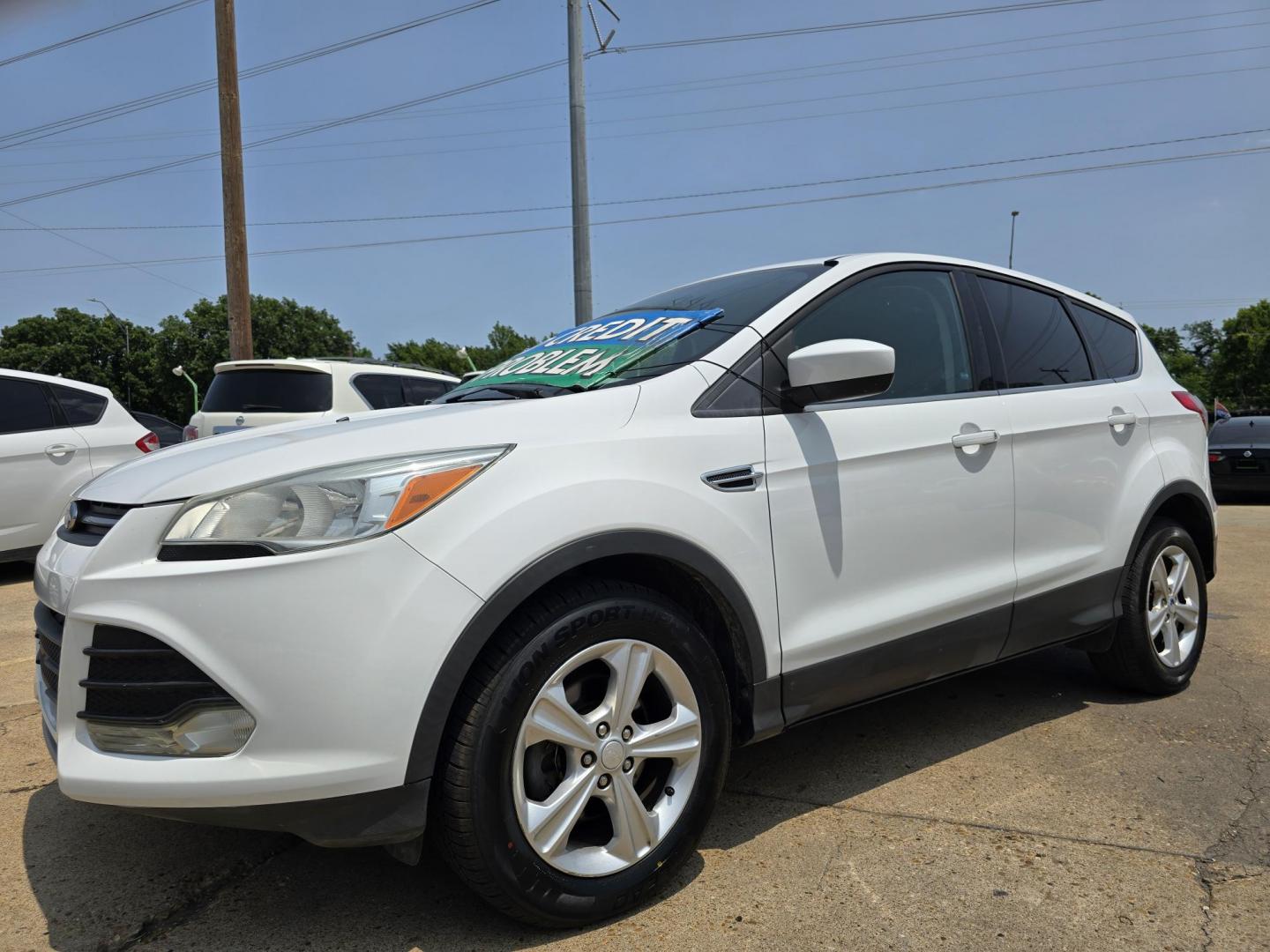 2013 Ford Escape SE (1FMCU0GX8DU) with an 1.6L L4 DOHC 16V engine, 6-Speed Automatic transmission, located at 2660 S.Garland Avenue, Garland, TX, 75041, (469) 298-3118, 32.885551, -96.655602 - Welcome to DallasAutos4Less, one of the Premier BUY HERE PAY HERE Dealers in the North Dallas Area. We specialize in financing to people with NO CREDIT or BAD CREDIT. We need proof of income, proof of residence, and a ID. Come buy your new car from us today!! This is a Super Clean 2013 FORD ESCAP - Photo#7