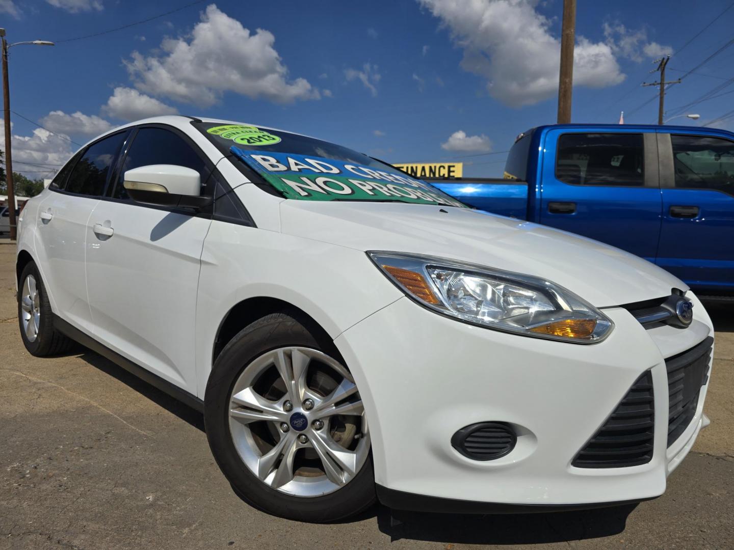 2013 WHITE Ford Focus SE (1FADP3F20DL) with an 2.0L L4 DOHC 16V engine, AUTO transmission, located at 2660 S.Garland Avenue, Garland, TX, 75041, (469) 298-3118, 32.885551, -96.655602 - Welcome to DallasAutos4Less, one of the Premier BUY HERE PAY HERE Dealers in the North Dallas Area. We specialize in financing to people with NO CREDIT or BAD CREDIT. We need proof of income, proof of residence, and a ID. Come buy your new car from us today!! This is a Super Clean 2013 FORD FOCUS - Photo#0