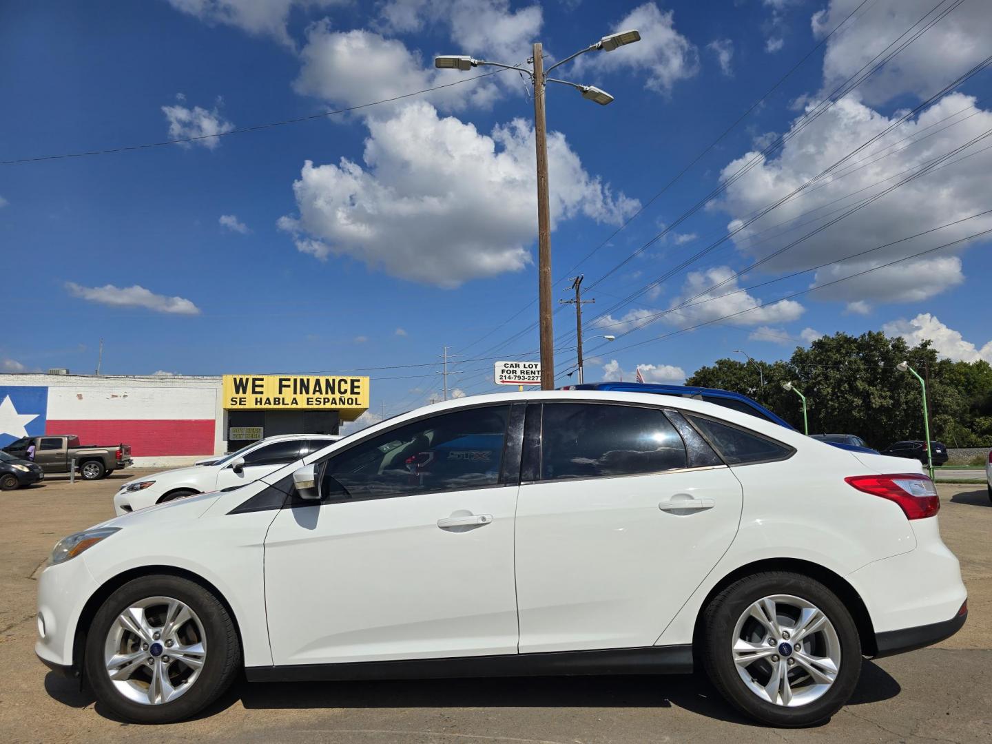 2013 WHITE Ford Focus SE (1FADP3F20DL) with an 2.0L L4 DOHC 16V engine, AUTO transmission, located at 2660 S.Garland Avenue, Garland, TX, 75041, (469) 298-3118, 32.885551, -96.655602 - Welcome to DallasAutos4Less, one of the Premier BUY HERE PAY HERE Dealers in the North Dallas Area. We specialize in financing to people with NO CREDIT or BAD CREDIT. We need proof of income, proof of residence, and a ID. Come buy your new car from us today!! This is a Super Clean 2013 FORD FOCUS - Photo#7