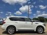 2013 DIAMOND WHITE Infiniti QX56 (JN8AZ2NEXD9) with an 5.6L V8 DOHC 32V engine, 5-Speed Automatic transmission, located at 2660 S.Garland Avenue, Garland, TX, 75041, (469) 298-3118, 32.885551, -96.655602 - Photo#2
