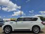 2013 DIAMOND WHITE Infiniti QX56 (JN8AZ2NEXD9) with an 5.6L V8 DOHC 32V engine, 5-Speed Automatic transmission, located at 2660 S.Garland Avenue, Garland, TX, 75041, (469) 298-3118, 32.885551, -96.655602 - Photo#7