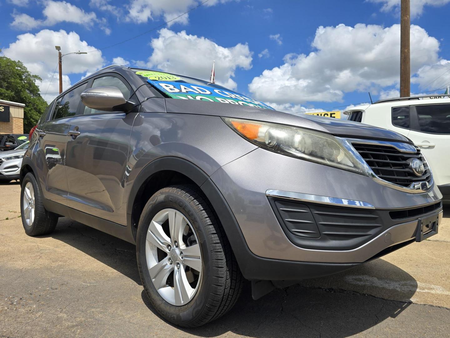 2013 GRAY Kia Sportage LX (KNDPB3A23D7) with an 2.4L V6 DOHC 24V engine, 6-Speed Automatic transmission, located at 2660 S.Garland Avenue, Garland, TX, 75041, (469) 298-3118, 32.885551, -96.655602 - BRAND NEW MOTOR FROM KIA. 3YR/36K MILE WARRANTY WITH KIA. - Photo#1