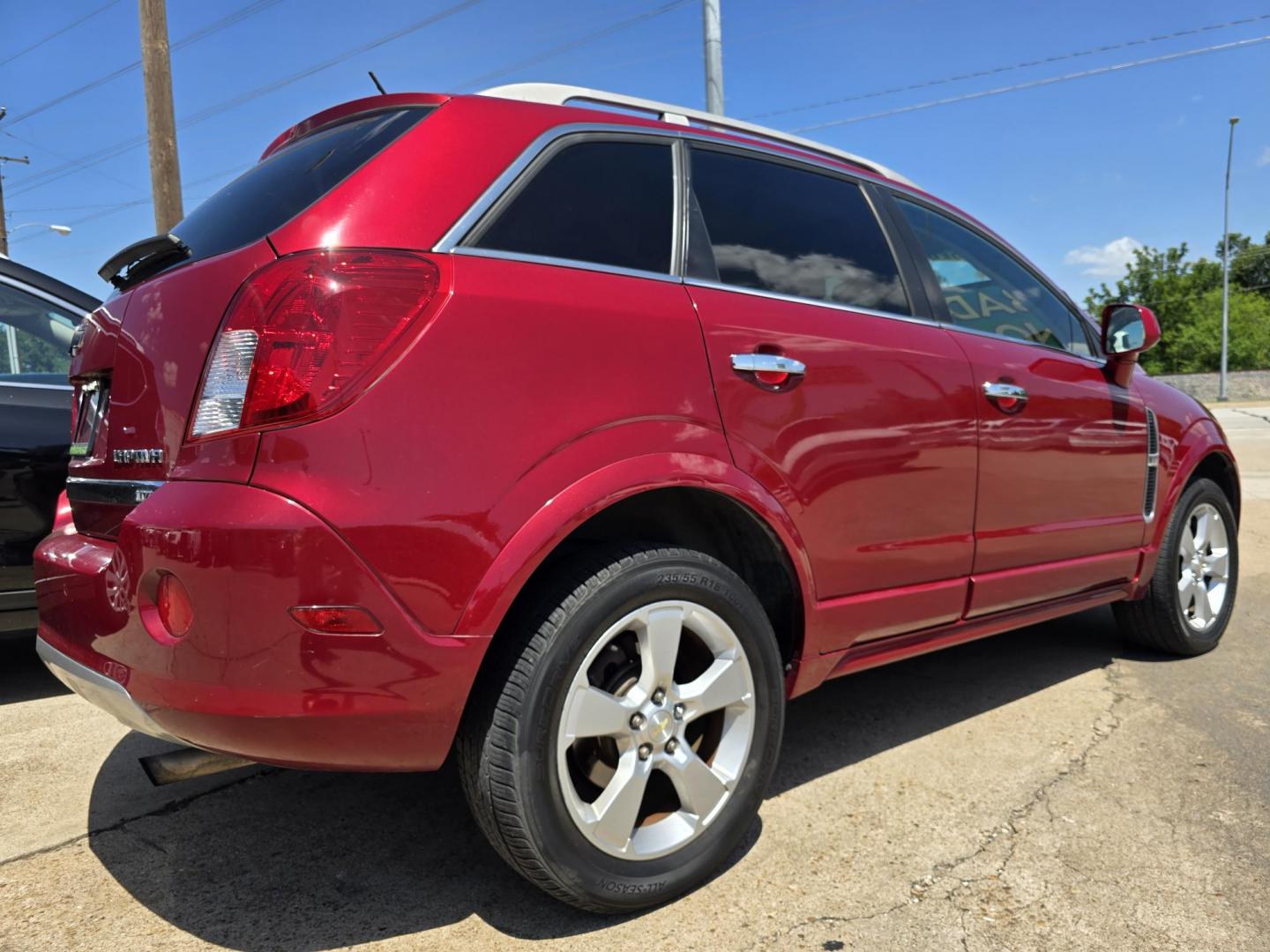 2014 RED /BLACK Chevrolet Captiva Sport LTZ (3GNAL4EK8ES) with an 2.4L L4 DOHC 16V FFV engine, 6-Speed Automatic transmission, located at 2660 S.Garland Avenue, Garland, TX, 75041, (469) 298-3118, 32.885551, -96.655602 - Welcome to DallasAutos4Less, one of the Premier BUY HERE PAY HERE Dealers in the North Dallas Area. We specialize in financing to people with NO CREDIT or BAD CREDIT. We need proof of income, proof of residence, and a ID. Come buy your new car from us today!! This is a Loaded 2014 CHEVY CAPTIVA L - Photo#3