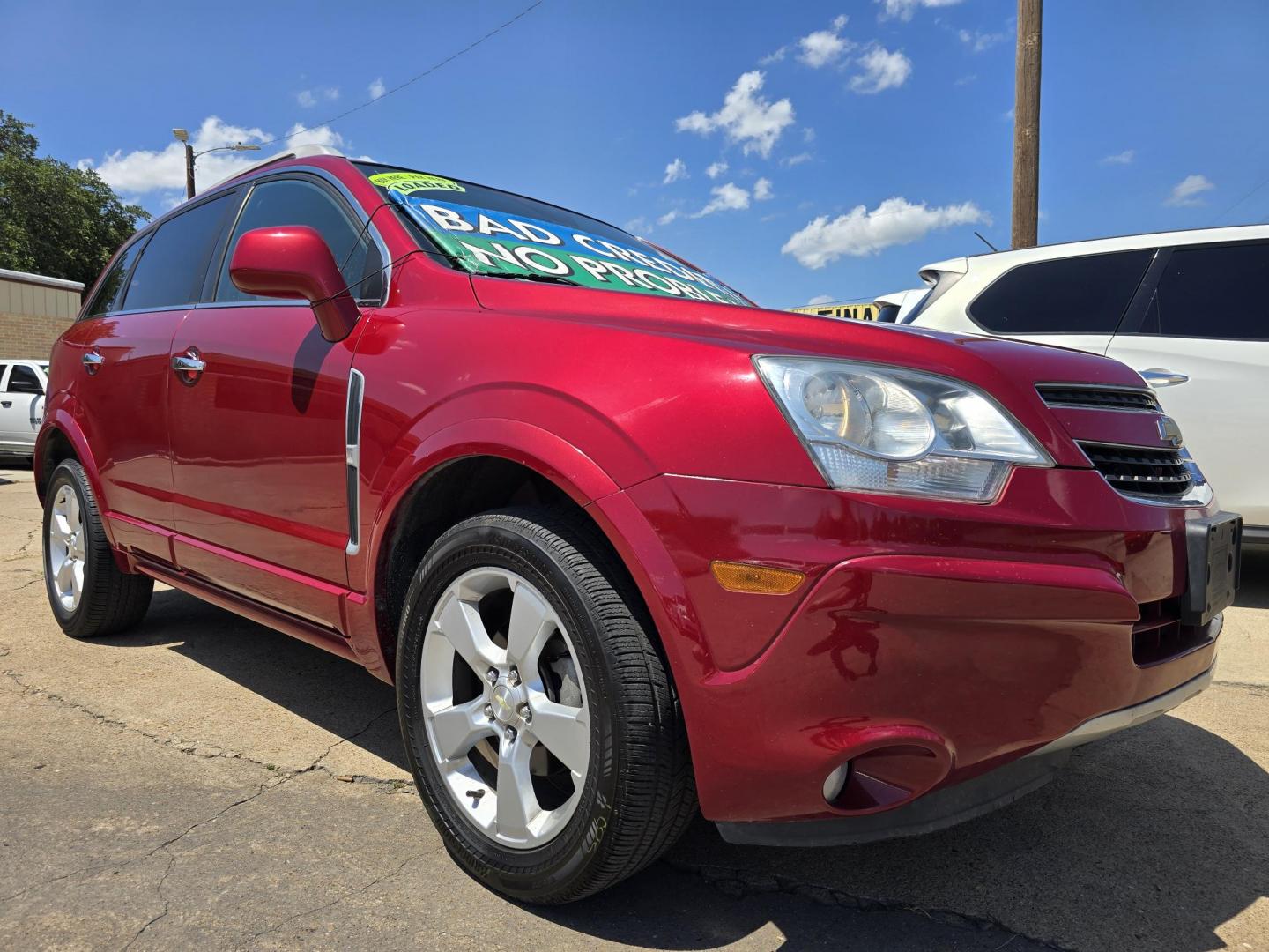 2014 RED /BLACK Chevrolet Captiva Sport LTZ (3GNAL4EK8ES) with an 2.4L L4 DOHC 16V FFV engine, 6-Speed Automatic transmission, located at 2660 S.Garland Avenue, Garland, TX, 75041, (469) 298-3118, 32.885551, -96.655602 - Welcome to DallasAutos4Less, one of the Premier BUY HERE PAY HERE Dealers in the North Dallas Area. We specialize in financing to people with NO CREDIT or BAD CREDIT. We need proof of income, proof of residence, and a ID. Come buy your new car from us today!! This is a Loaded 2014 CHEVY CAPTIVA L - Photo#1