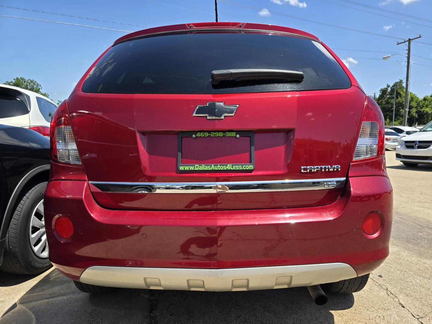 2014 RED /BLACK Chevrolet Captiva Sport LTZ (3GNAL4EK8ES) with an 2.4L L4 DOHC 16V FFV engine, 6-Speed Automatic transmission, located at 2660 S.Garland Avenue, Garland, TX, 75041, (469) 298-3118, 32.885551, -96.655602 - Welcome to DallasAutos4Less, one of the Premier BUY HERE PAY HERE Dealers in the North Dallas Area. We specialize in financing to people with NO CREDIT or BAD CREDIT. We need proof of income, proof of residence, and a ID. Come buy your new car from us today!! This is a Loaded 2014 CHEVY CAPTIVA L - Photo#4