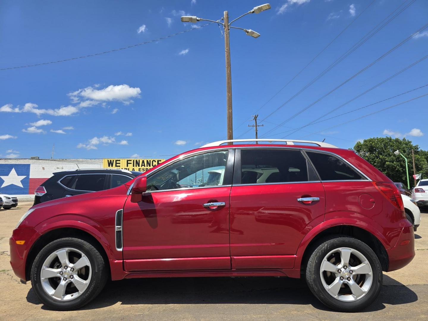 2014 RED /BLACK Chevrolet Captiva Sport LTZ (3GNAL4EK8ES) with an 2.4L L4 DOHC 16V FFV engine, 6-Speed Automatic transmission, located at 2660 S.Garland Avenue, Garland, TX, 75041, (469) 298-3118, 32.885551, -96.655602 - Welcome to DallasAutos4Less, one of the Premier BUY HERE PAY HERE Dealers in the North Dallas Area. We specialize in financing to people with NO CREDIT or BAD CREDIT. We need proof of income, proof of residence, and a ID. Come buy your new car from us today!! This is a Loaded 2014 CHEVY CAPTIVA L - Photo#6