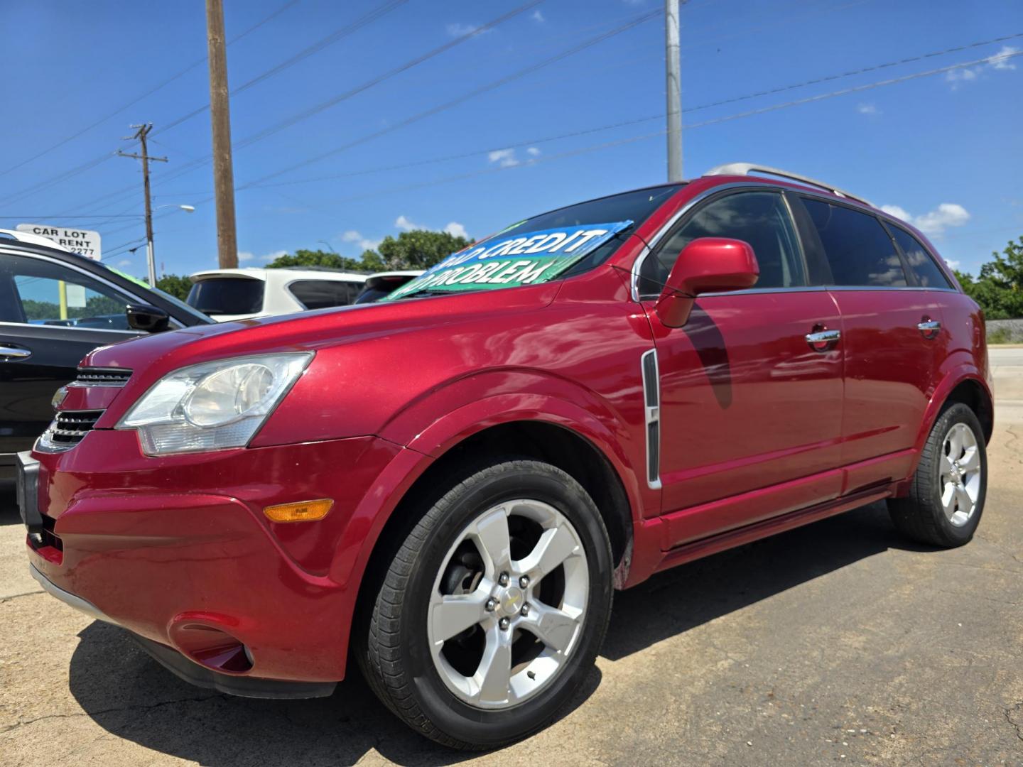 2014 RED /BLACK Chevrolet Captiva Sport LTZ (3GNAL4EK8ES) with an 2.4L L4 DOHC 16V FFV engine, 6-Speed Automatic transmission, located at 2660 S.Garland Avenue, Garland, TX, 75041, (469) 298-3118, 32.885551, -96.655602 - Welcome to DallasAutos4Less, one of the Premier BUY HERE PAY HERE Dealers in the North Dallas Area. We specialize in financing to people with NO CREDIT or BAD CREDIT. We need proof of income, proof of residence, and a ID. Come buy your new car from us today!! This is a Loaded 2014 CHEVY CAPTIVA L - Photo#7