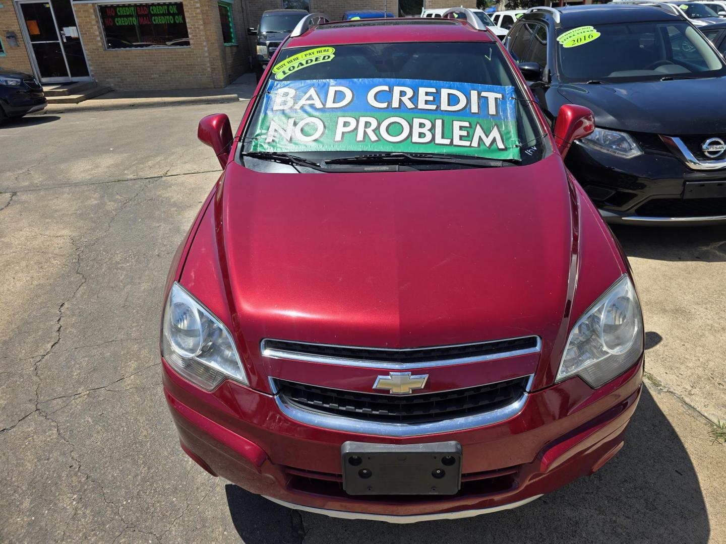 2014 RED /BLACK Chevrolet Captiva Sport LTZ (3GNAL4EK8ES) with an 2.4L L4 DOHC 16V FFV engine, 6-Speed Automatic transmission, located at 2660 S.Garland Avenue, Garland, TX, 75041, (469) 298-3118, 32.885551, -96.655602 - Welcome to DallasAutos4Less, one of the Premier BUY HERE PAY HERE Dealers in the North Dallas Area. We specialize in financing to people with NO CREDIT or BAD CREDIT. We need proof of income, proof of residence, and a ID. Come buy your new car from us today!! This is a Loaded 2014 CHEVY CAPTIVA L - Photo#8
