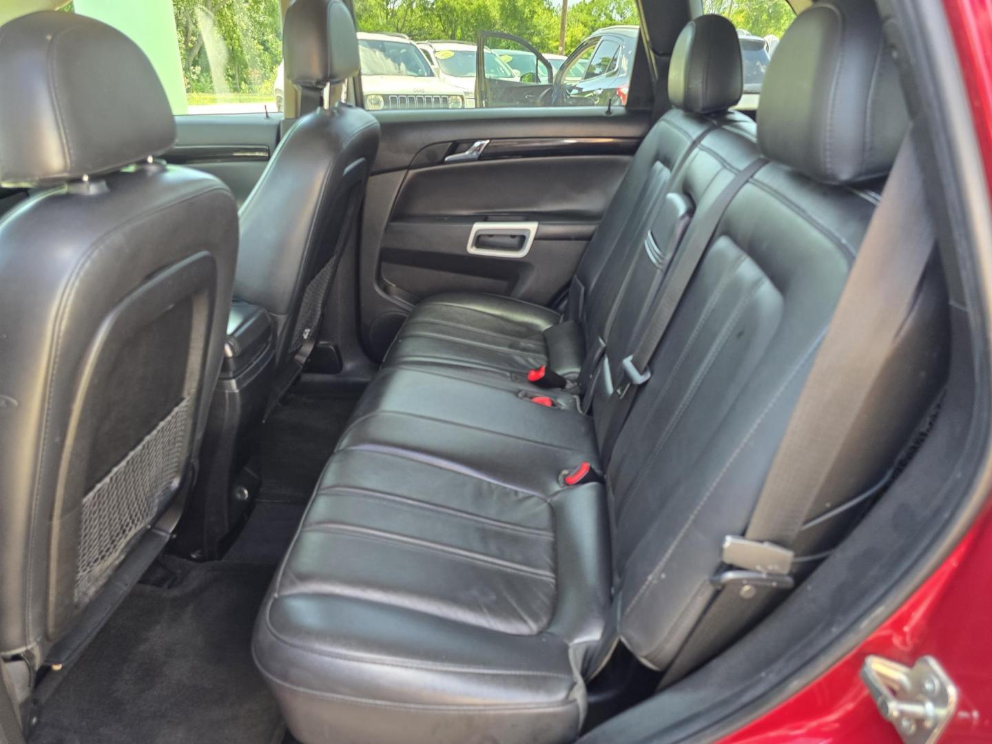 2014 RED /BLACK Chevrolet Captiva Sport LTZ (3GNAL4EK8ES) with an 2.4L L4 DOHC 16V FFV engine, 6-Speed Automatic transmission, located at 2660 S.Garland Avenue, Garland, TX, 75041, (469) 298-3118, 32.885551, -96.655602 - Welcome to DallasAutos4Less, one of the Premier BUY HERE PAY HERE Dealers in the North Dallas Area. We specialize in financing to people with NO CREDIT or BAD CREDIT. We need proof of income, proof of residence, and a ID. Come buy your new car from us today!! This is a Loaded 2014 CHEVY CAPTIVA L - Photo#17