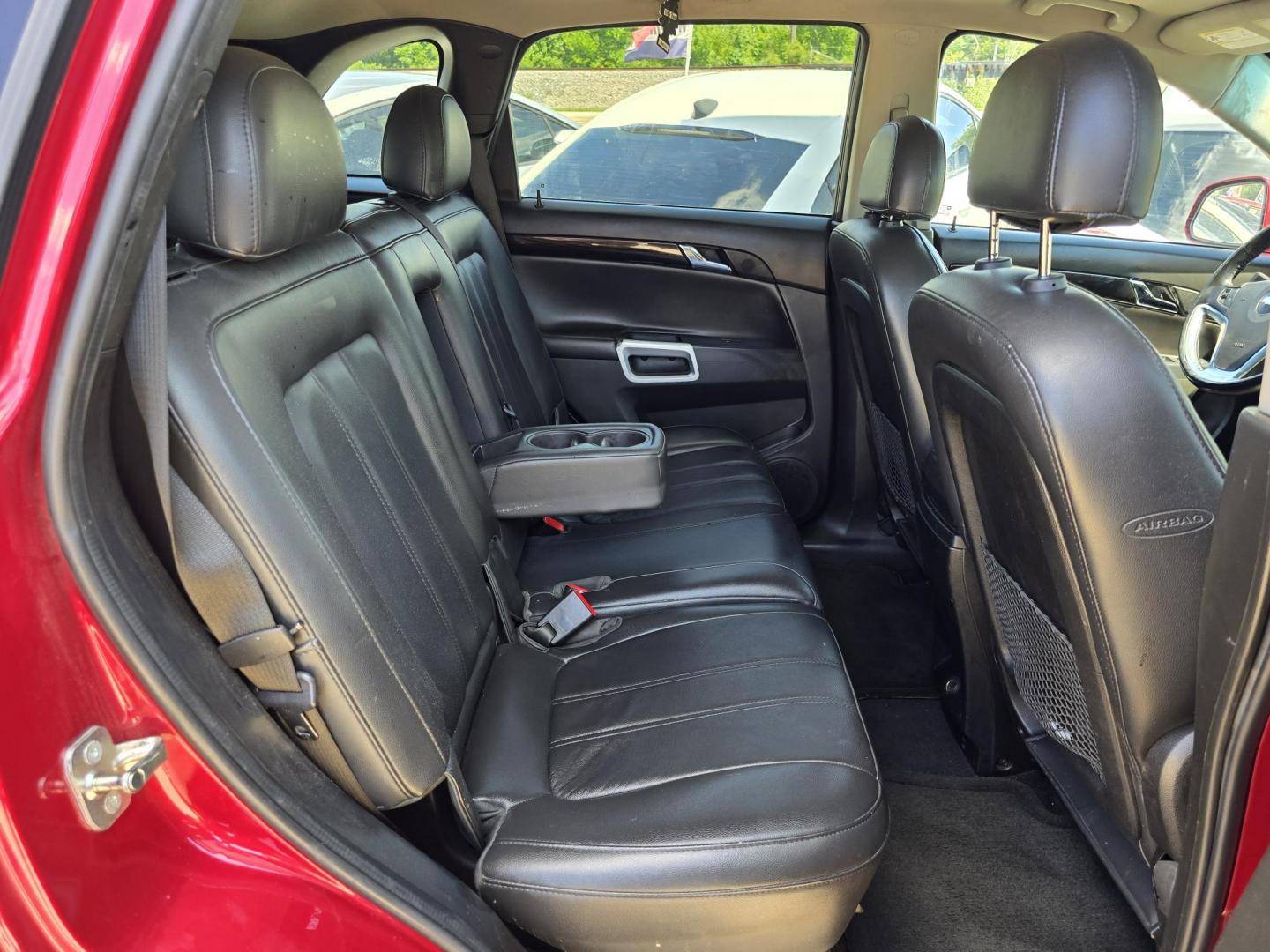 2014 RED /BLACK Chevrolet Captiva Sport LTZ (3GNAL4EK8ES) with an 2.4L L4 DOHC 16V FFV engine, 6-Speed Automatic transmission, located at 2660 S.Garland Avenue, Garland, TX, 75041, (469) 298-3118, 32.885551, -96.655602 - Welcome to DallasAutos4Less, one of the Premier BUY HERE PAY HERE Dealers in the North Dallas Area. We specialize in financing to people with NO CREDIT or BAD CREDIT. We need proof of income, proof of residence, and a ID. Come buy your new car from us today!! This is a Loaded 2014 CHEVY CAPTIVA L - Photo#19