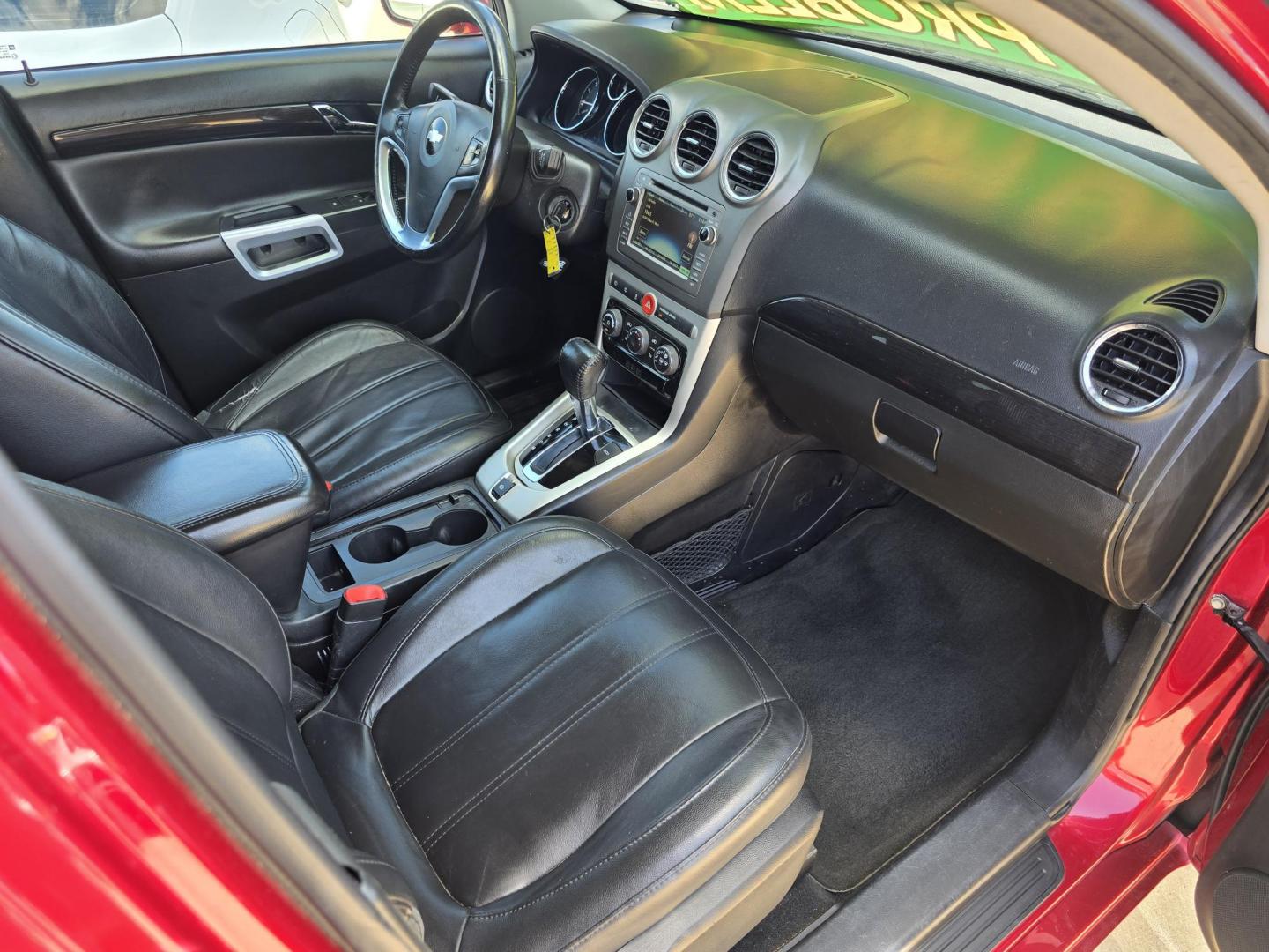 2014 RED /BLACK Chevrolet Captiva Sport LTZ (3GNAL4EK8ES) with an 2.4L L4 DOHC 16V FFV engine, 6-Speed Automatic transmission, located at 2660 S.Garland Avenue, Garland, TX, 75041, (469) 298-3118, 32.885551, -96.655602 - Welcome to DallasAutos4Less, one of the Premier BUY HERE PAY HERE Dealers in the North Dallas Area. We specialize in financing to people with NO CREDIT or BAD CREDIT. We need proof of income, proof of residence, and a ID. Come buy your new car from us today!! This is a Loaded 2014 CHEVY CAPTIVA L - Photo#21