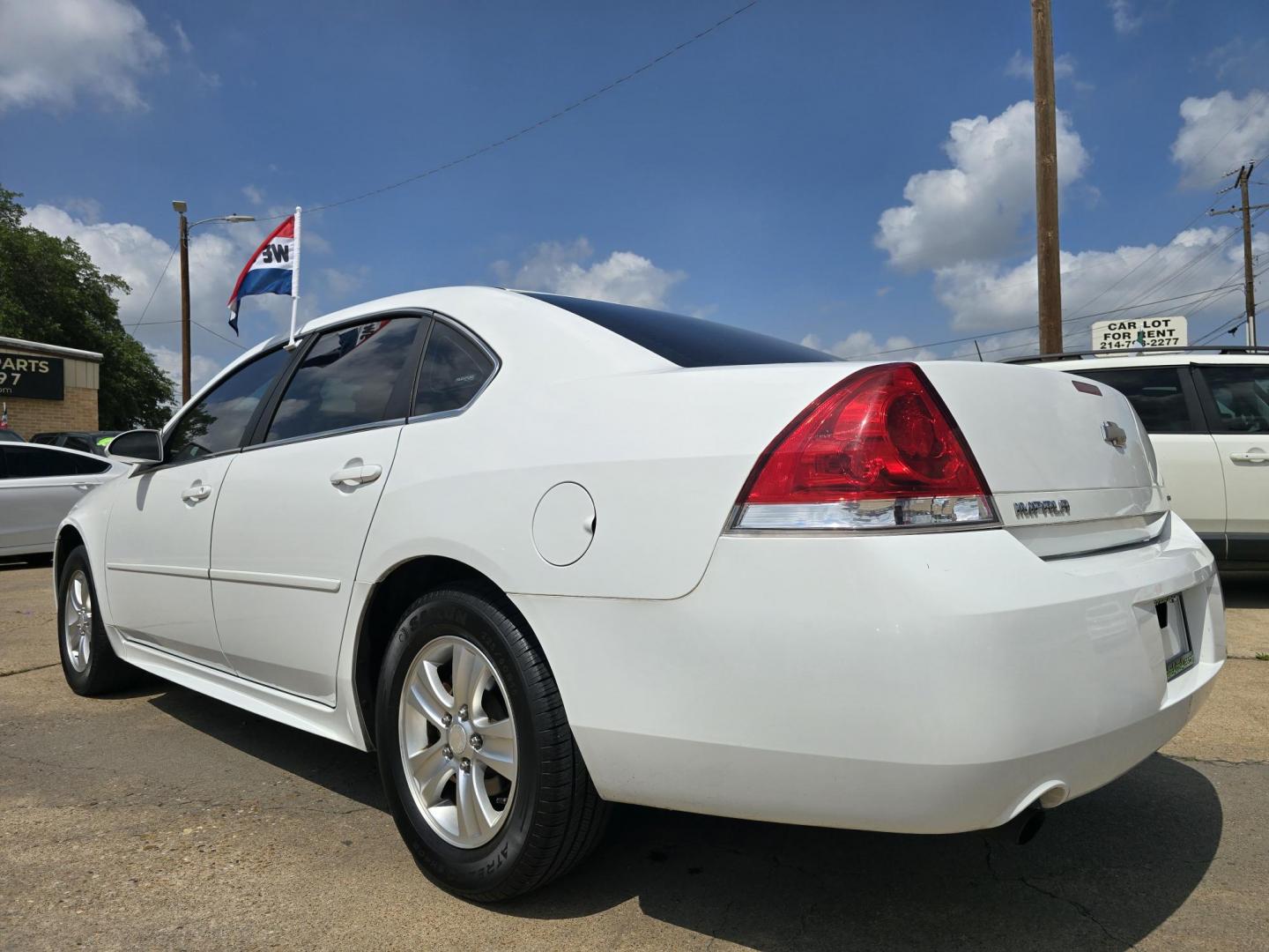 2014 WHITE Chevrolet Impala LS (2G1WA5E38E1) with an 3.6L V6 DOHC 16V FFV engine, 6-Speed Automatic transmission, located at 2660 S.Garland Avenue, Garland, TX, 75041, (469) 298-3118, 32.885551, -96.655602 - Photo#5