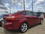 2014 RED /BEIGE FORD FOCUS SE SE (1FADP3F24EL) , AUTO transmission, located at 2660 S.Garland Avenue, Garland, TX, 75041, (469) 298-3118, 32.885551, -96.655602 - Welcome to DallasAutos4Less, one of the Premier BUY HERE PAY HERE Dealers in the North Dallas Area. We specialize in financing to people with NO CREDIT or BAD CREDIT. We need proof of income, proof of residence, and a ID. Come buy your new car from us today!! This is a Very clean 2014 FORD FOCUS - Photo#3