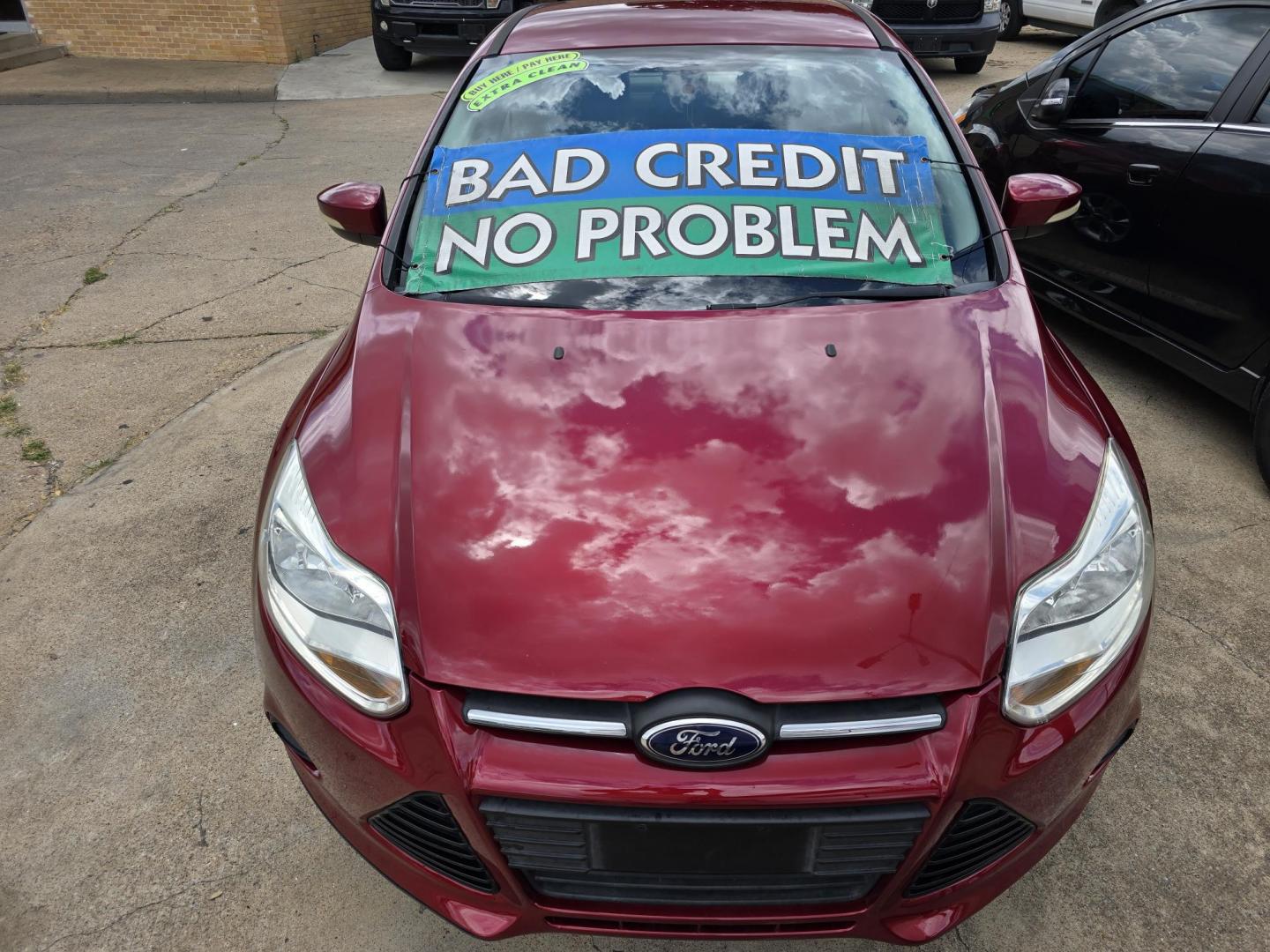 2014 RED /BEIGE FORD FOCUS SE SE (1FADP3F24EL) , AUTO transmission, located at 2660 S.Garland Avenue, Garland, TX, 75041, (469) 298-3118, 32.885551, -96.655602 - Welcome to DallasAutos4Less, one of the Premier BUY HERE PAY HERE Dealers in the North Dallas Area. We specialize in financing to people with NO CREDIT or BAD CREDIT. We need proof of income, proof of residence, and a ID. Come buy your new car from us today!! This is a Very clean 2014 FORD FOCUS - Photo#8
