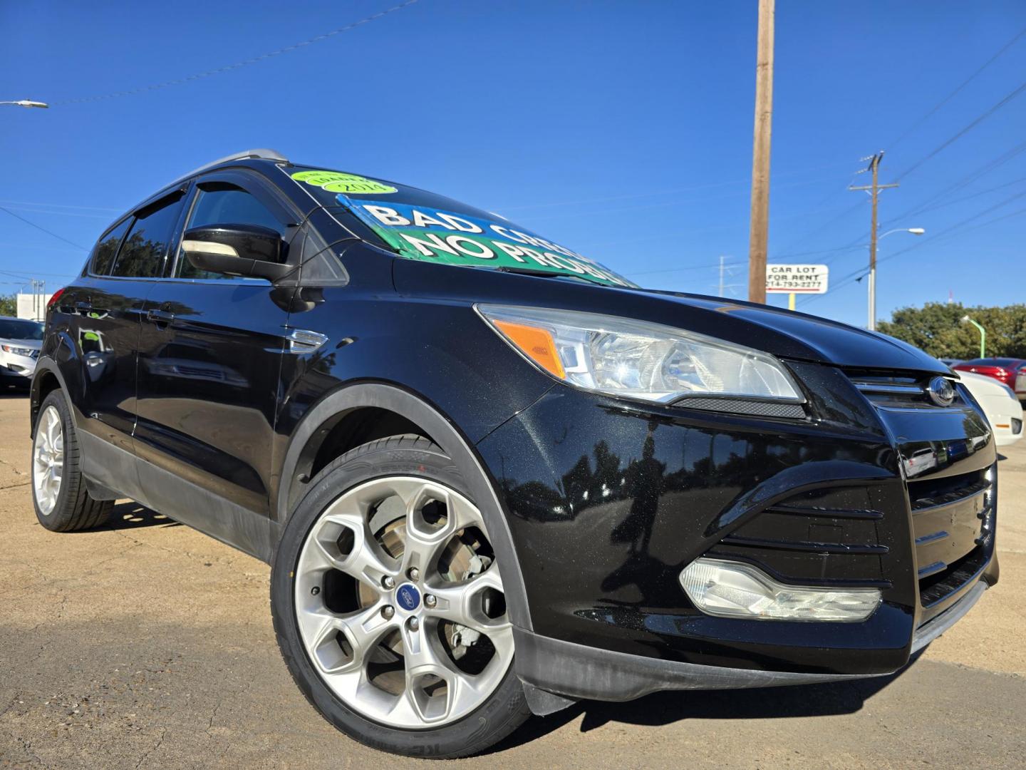 2014 BLACK Ford Escape Titanium (1FMCU0JX4EU) with an 1.6L L4 DOHC 16V engine, 6-Speed Automatic transmission, located at 2660 S.Garland Avenue, Garland, TX, 75041, (469) 298-3118, 32.885551, -96.655602 - Welcome to DallasAutos4Less, one of the Premier BUY HERE PAY HERE Dealers in the North Dallas Area. We specialize in financing to people with NO CREDIT or BAD CREDIT. We need proof of income, proof of residence, and a ID. Come buy your new car from us today!! This is a Super Clean 2014 FORD ESCAP - Photo#0