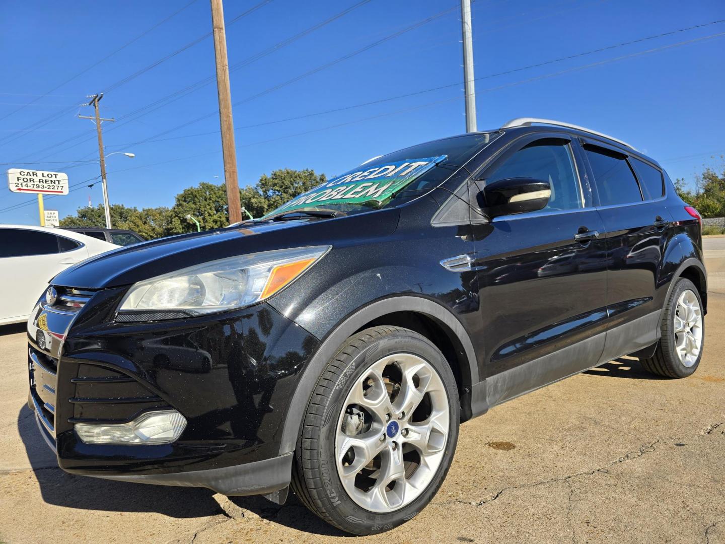 2014 BLACK Ford Escape Titanium (1FMCU0JX4EU) with an 1.6L L4 DOHC 16V engine, 6-Speed Automatic transmission, located at 2660 S.Garland Avenue, Garland, TX, 75041, (469) 298-3118, 32.885551, -96.655602 - Welcome to DallasAutos4Less, one of the Premier BUY HERE PAY HERE Dealers in the North Dallas Area. We specialize in financing to people with NO CREDIT or BAD CREDIT. We need proof of income, proof of residence, and a ID. Come buy your new car from us today!! This is a Super Clean 2014 FORD ESCAP - Photo#7