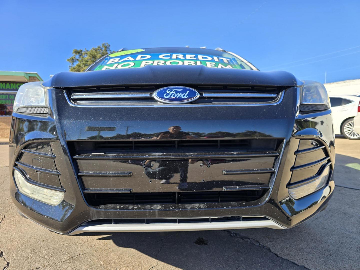 2014 BLACK Ford Escape Titanium (1FMCU0JX4EU) with an 1.6L L4 DOHC 16V engine, 6-Speed Automatic transmission, located at 2660 S.Garland Avenue, Garland, TX, 75041, (469) 298-3118, 32.885551, -96.655602 - Welcome to DallasAutos4Less, one of the Premier BUY HERE PAY HERE Dealers in the North Dallas Area. We specialize in financing to people with NO CREDIT or BAD CREDIT. We need proof of income, proof of residence, and a ID. Come buy your new car from us today!! This is a Super Clean 2014 FORD ESCAP - Photo#9