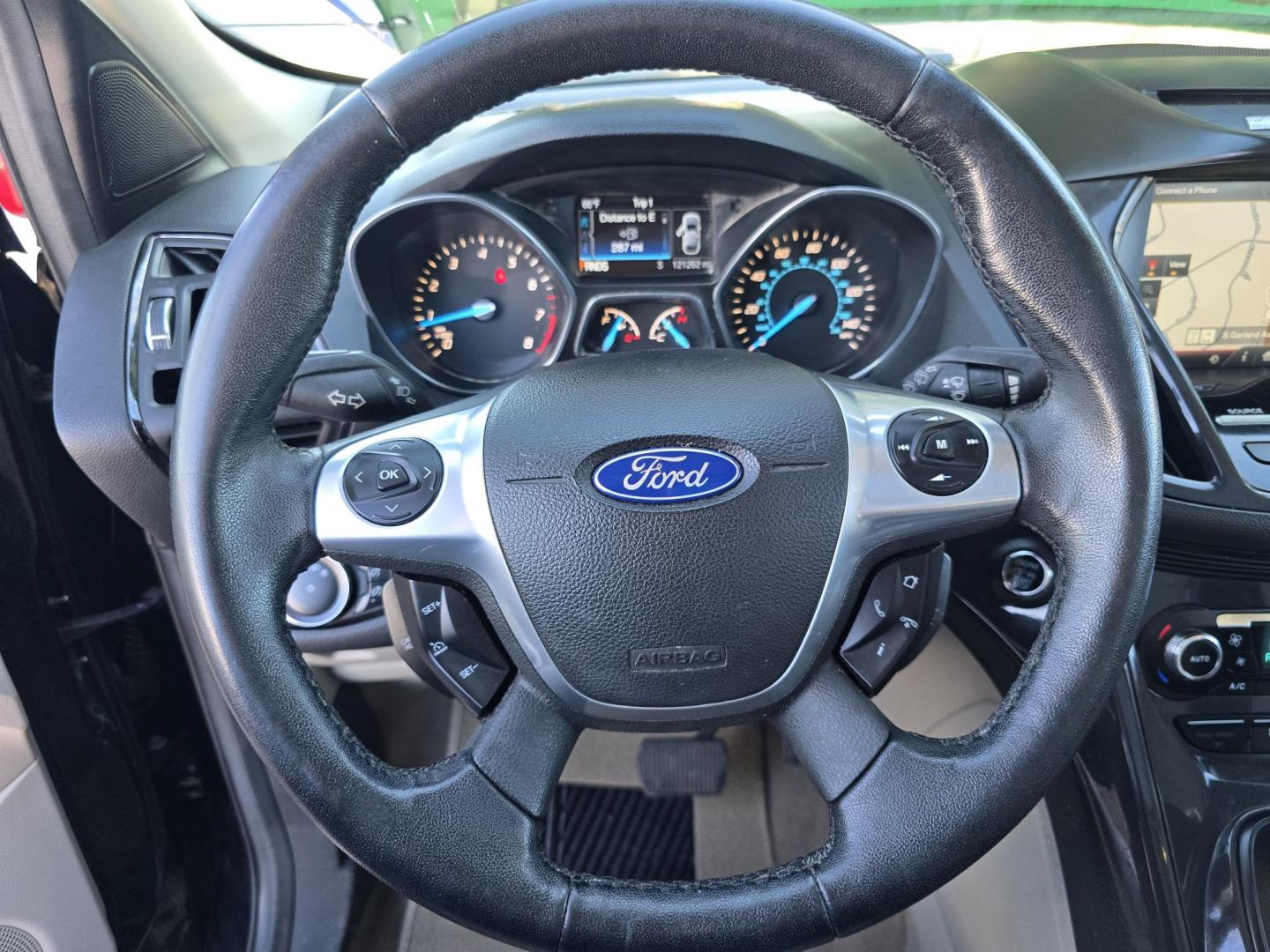 2014 BLACK Ford Escape Titanium (1FMCU0JX4EU) with an 1.6L L4 DOHC 16V engine, 6-Speed Automatic transmission, located at 2660 S.Garland Avenue, Garland, TX, 75041, (469) 298-3118, 32.885551, -96.655602 - Welcome to DallasAutos4Less, one of the Premier BUY HERE PAY HERE Dealers in the North Dallas Area. We specialize in financing to people with NO CREDIT or BAD CREDIT. We need proof of income, proof of residence, and a ID. Come buy your new car from us today!! This is a Super Clean 2014 FORD ESCAP - Photo#12