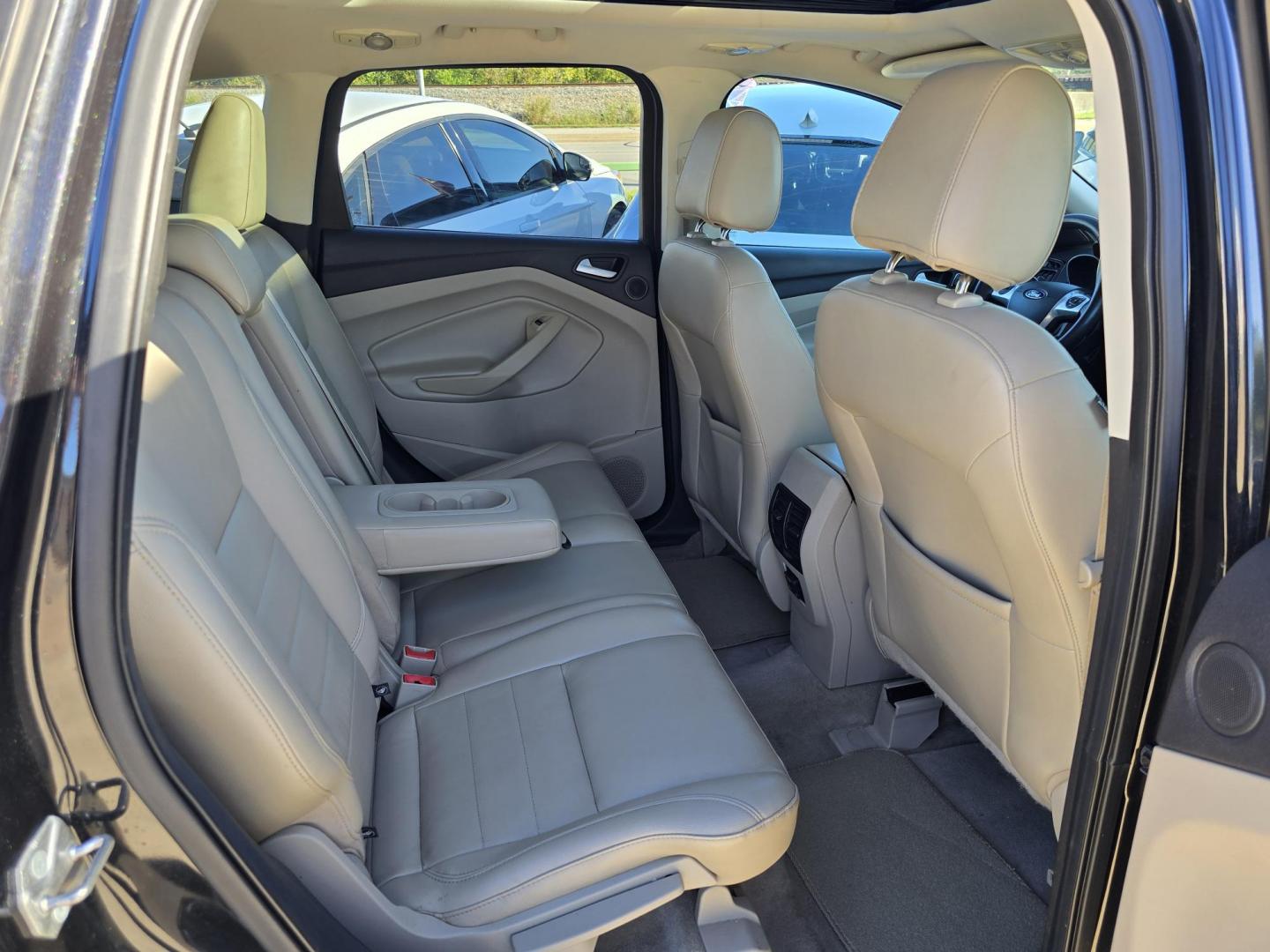 2014 BLACK Ford Escape Titanium (1FMCU0JX4EU) with an 1.6L L4 DOHC 16V engine, 6-Speed Automatic transmission, located at 2660 S.Garland Avenue, Garland, TX, 75041, (469) 298-3118, 32.885551, -96.655602 - Welcome to DallasAutos4Less, one of the Premier BUY HERE PAY HERE Dealers in the North Dallas Area. We specialize in financing to people with NO CREDIT or BAD CREDIT. We need proof of income, proof of residence, and a ID. Come buy your new car from us today!! This is a Super Clean 2014 FORD ESCAP - Photo#21