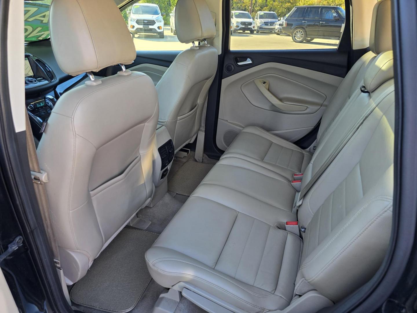 2014 BLACK Ford Escape Titanium (1FMCU0JX4EU) with an 1.6L L4 DOHC 16V engine, 6-Speed Automatic transmission, located at 2660 S.Garland Avenue, Garland, TX, 75041, (469) 298-3118, 32.885551, -96.655602 - Welcome to DallasAutos4Less, one of the Premier BUY HERE PAY HERE Dealers in the North Dallas Area. We specialize in financing to people with NO CREDIT or BAD CREDIT. We need proof of income, proof of residence, and a ID. Come buy your new car from us today!! This is a Super Clean 2014 FORD ESCAP - Photo#19