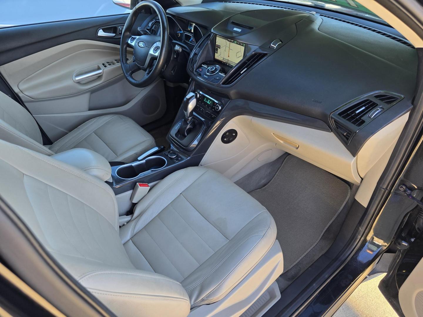 2014 BLACK Ford Escape Titanium (1FMCU0JX4EU) with an 1.6L L4 DOHC 16V engine, 6-Speed Automatic transmission, located at 2660 S.Garland Avenue, Garland, TX, 75041, (469) 298-3118, 32.885551, -96.655602 - Welcome to DallasAutos4Less, one of the Premier BUY HERE PAY HERE Dealers in the North Dallas Area. We specialize in financing to people with NO CREDIT or BAD CREDIT. We need proof of income, proof of residence, and a ID. Come buy your new car from us today!! This is a Super Clean 2014 FORD ESCAP - Photo#23