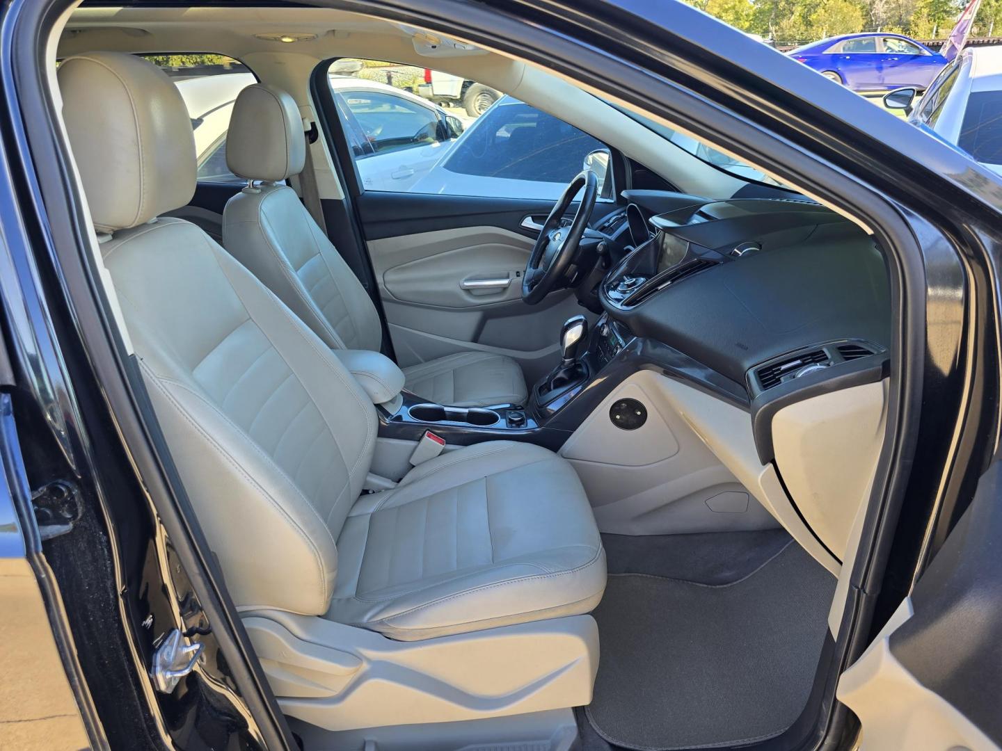 2014 BLACK Ford Escape Titanium (1FMCU0JX4EU) with an 1.6L L4 DOHC 16V engine, 6-Speed Automatic transmission, located at 2660 S.Garland Avenue, Garland, TX, 75041, (469) 298-3118, 32.885551, -96.655602 - Welcome to DallasAutos4Less, one of the Premier BUY HERE PAY HERE Dealers in the North Dallas Area. We specialize in financing to people with NO CREDIT or BAD CREDIT. We need proof of income, proof of residence, and a ID. Come buy your new car from us today!! This is a Super Clean 2014 FORD ESCAP - Photo#22