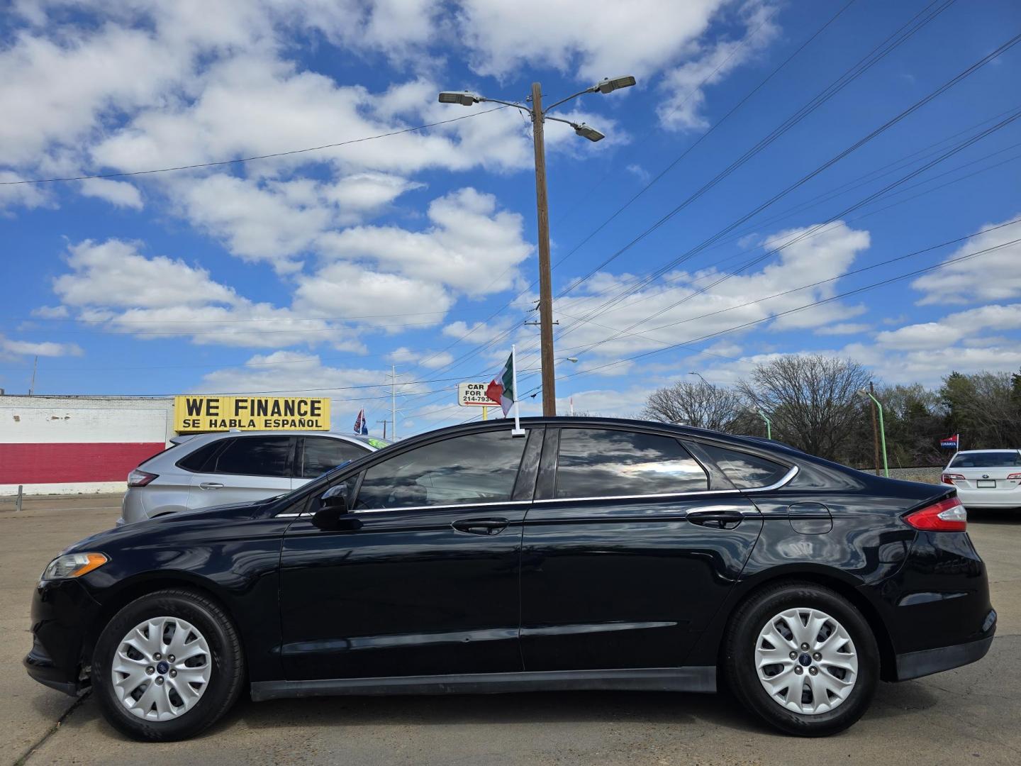 2014 Ford Fusion S (3FA6P0G71ER) with an 2.5L L4 DOHC 16V engine, AUTO transmission, located at 2660 S.Garland Avenue, Garland, TX, 75041, (469) 298-3118, 32.885551, -96.655602 - Welcome to DallasAutos4Less, one of the Premier BUY HERE PAY HERE Dealers in the North Dallas Area. We specialize in financing to people with NO CREDIT or BAD CREDIT. We need proof of income, proof of residence, and a ID. Come buy your new car from us today!! This is a Super Clean 2014 FORD FUSIO - Photo#6