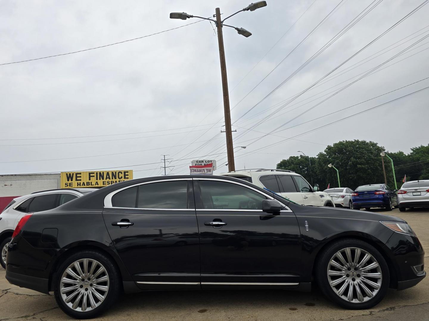 2014 BLACK Lincoln MKS FWD (1LNHL9DK4EG) with an 3.5L V6 DOHC 24V engine, 6-Speed Automatic transmission, located at 2660 S.Garland Avenue, Garland, TX, 75041, (469) 298-3118, 32.885551, -96.655602 - Photo#2