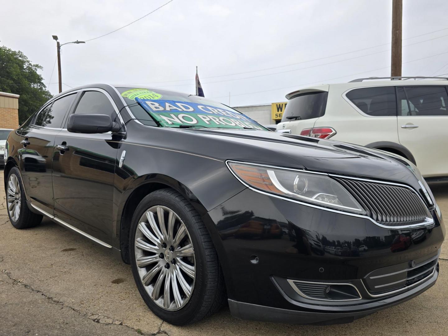 2014 BLACK Lincoln MKS FWD (1LNHL9DK4EG) with an 3.5L V6 DOHC 24V engine, 6-Speed Automatic transmission, located at 2660 S.Garland Avenue, Garland, TX, 75041, (469) 298-3118, 32.885551, -96.655602 - Photo#1