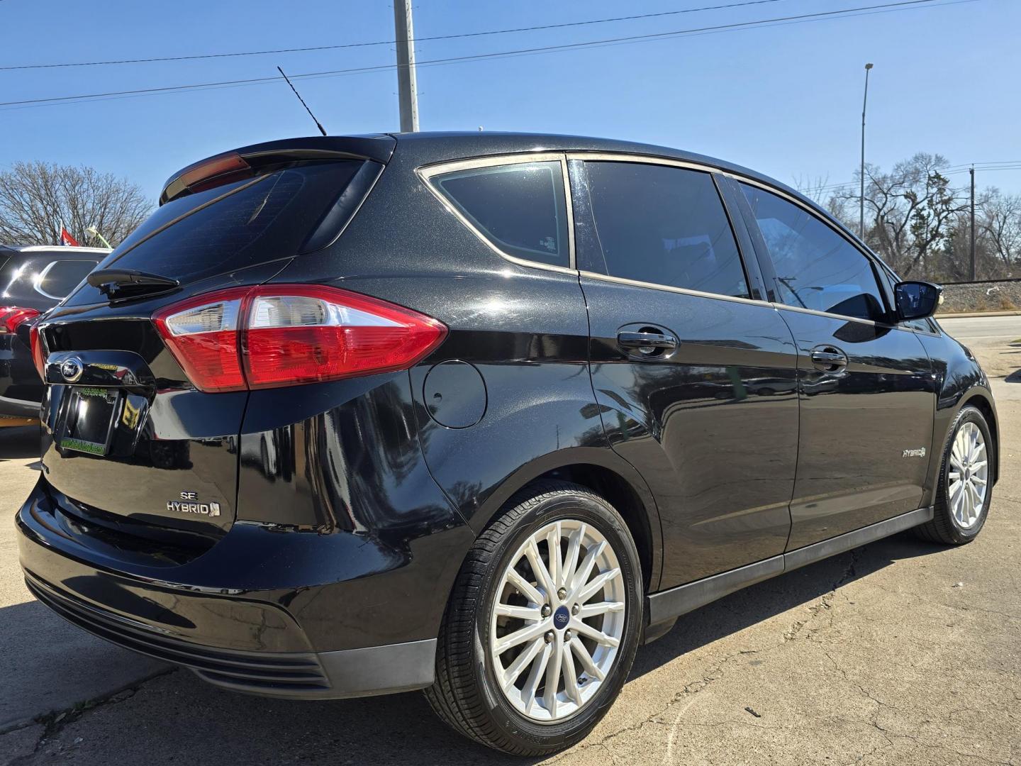 2015 BLACK METALLIC /BLACK Ford C-Max Hybrid SE (1FADP5AU7FL) with an 2.0L L4 DOHC 16V HYBRID engine, Continuously Variable Transmission transmission, located at 2660 S.Garland Avenue, Garland, TX, 75041, (469) 298-3118, 32.885551, -96.655602 - CASH$$$$$ CAR!! This is a Super Clean 2015 FORD C-MAX HYBRID SE! BLUETOOTH! SAT RADIO! SUPER CLEAN! MUST SEE! Come in for a test drive today. We are open from 10am-7pm Monday-Saturday. - Photo#3