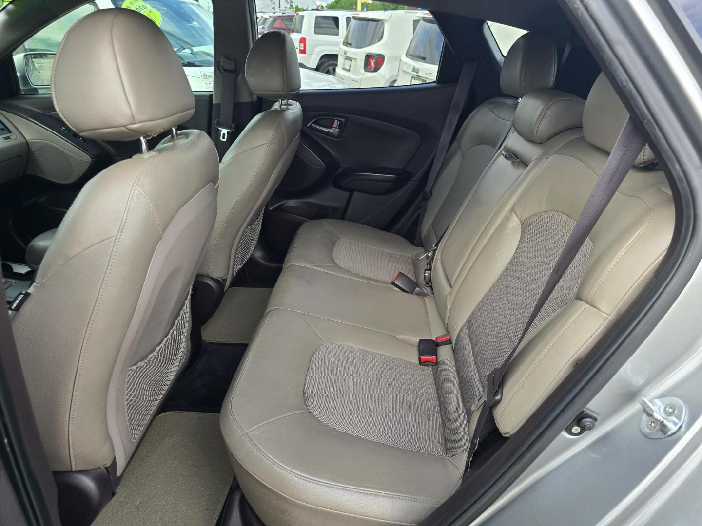 2015 GRAY Hyundai Tucson GLS (KM8JU3AG9FU) with an 2.4L L4 DOHC 16V engine, 6-Speed Automatic transmission, located at 2660 S.Garland Avenue, Garland, TX, 75041, (469) 298-3118, 32.885551, -96.655602 - Photo#16