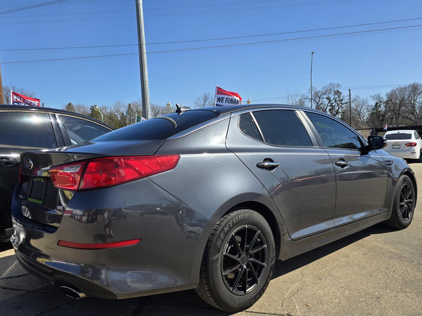 2015 DARK GRAY Kia Optima EX (KNAGM4A72F5) with an 2.4L L4 DOHC 16V engine, 6-Speed Automatic transmission, located at 2660 S.Garland Avenue, Garland, TX, 75041, (469) 298-3118, 32.885551, -96.655602 - Welcome to DallasAutos4Less, one of the Premier BUY HERE PAY HERE Dealers in the North Dallas Area. We specialize in financing to people with NO CREDIT or BAD CREDIT. We need proof of income, proof of residence, and a ID. Come buy your new car from us today!! This is a Very clean 2015 KIA OPTIMA - Photo#3