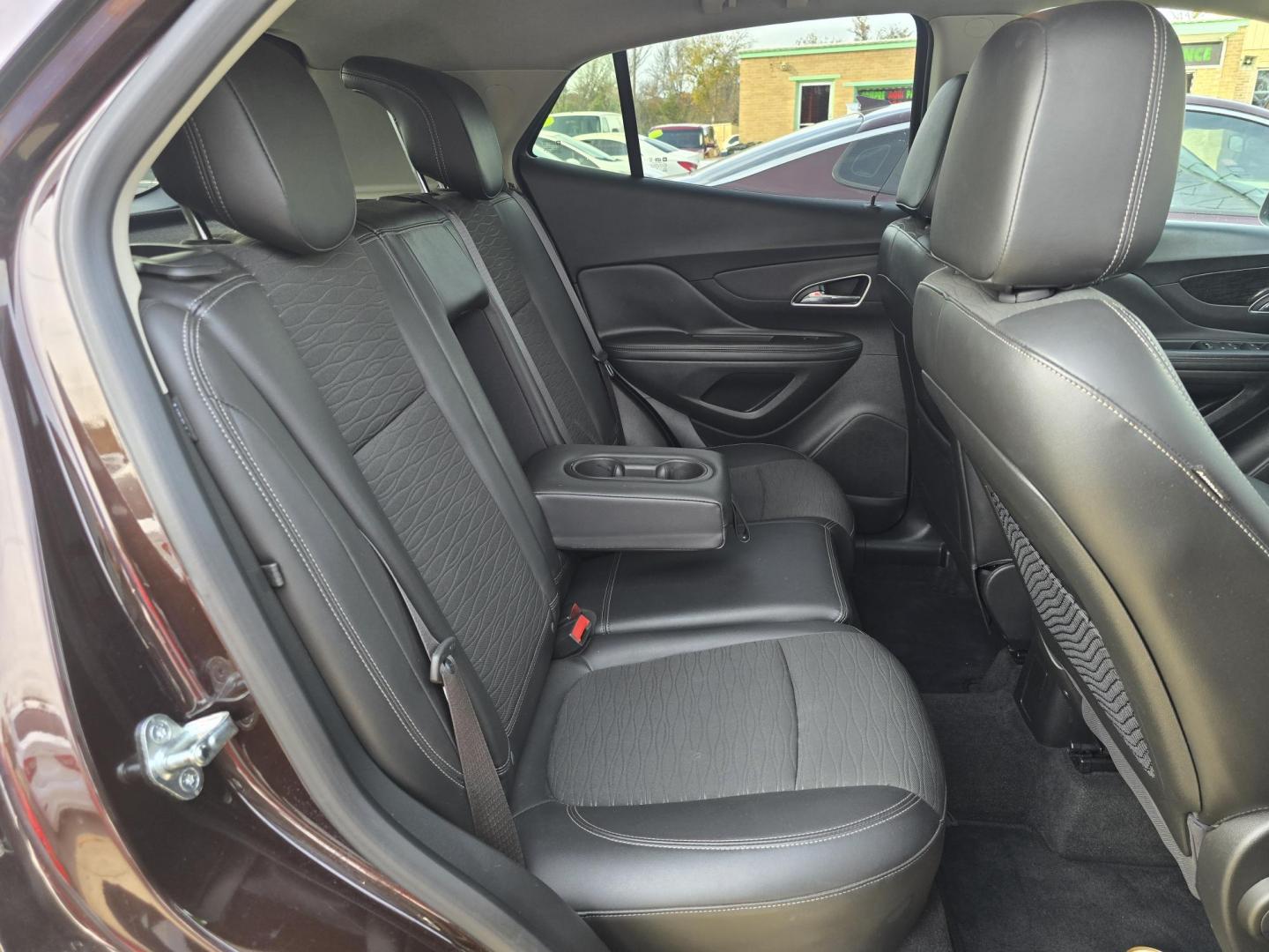 2016 PURPLE Buick Encore (KL4CJASB4GB) with an 1.4L L4 DOHC 16V TURBO engine, 6A transmission, located at 2660 S.Garland Avenue, Garland, TX, 75041, (469) 298-3118, 32.885551, -96.655602 - Photo#35