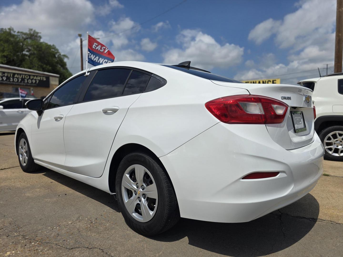 2016 WHITE Chevrolet Cruze LS (1G1BC5SM5G7) with an 1.4L L4 DOHC 16V TURBO engine, 6A transmission, located at 2660 S.Garland Avenue, Garland, TX, 75041, (469) 298-3118, 32.885551, -96.655602 - Photo#5