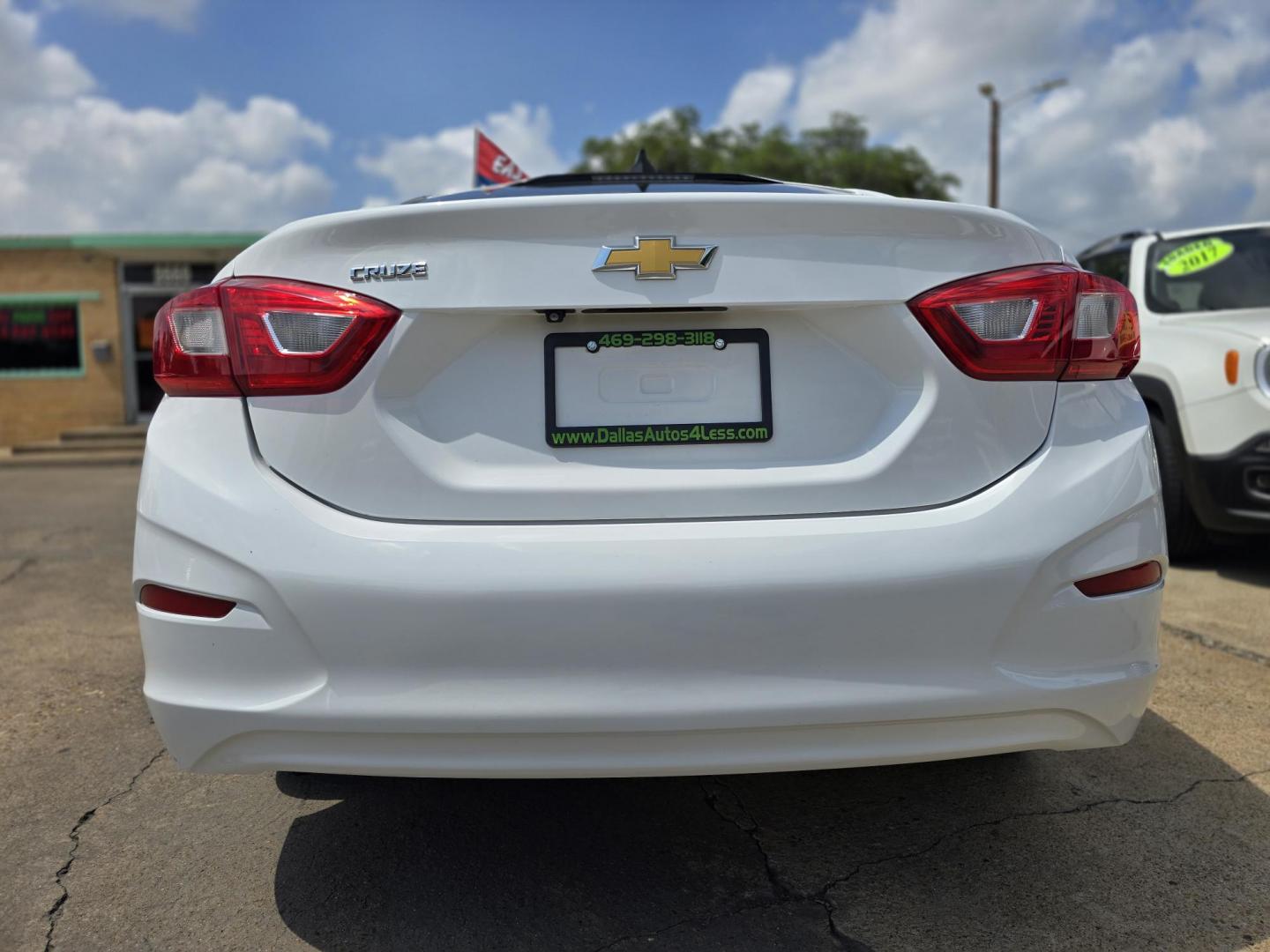 2016 WHITE Chevrolet Cruze LS (1G1BC5SM5G7) with an 1.4L L4 DOHC 16V TURBO engine, 6A transmission, located at 2660 S.Garland Avenue, Garland, TX, 75041, (469) 298-3118, 32.885551, -96.655602 - Photo#4