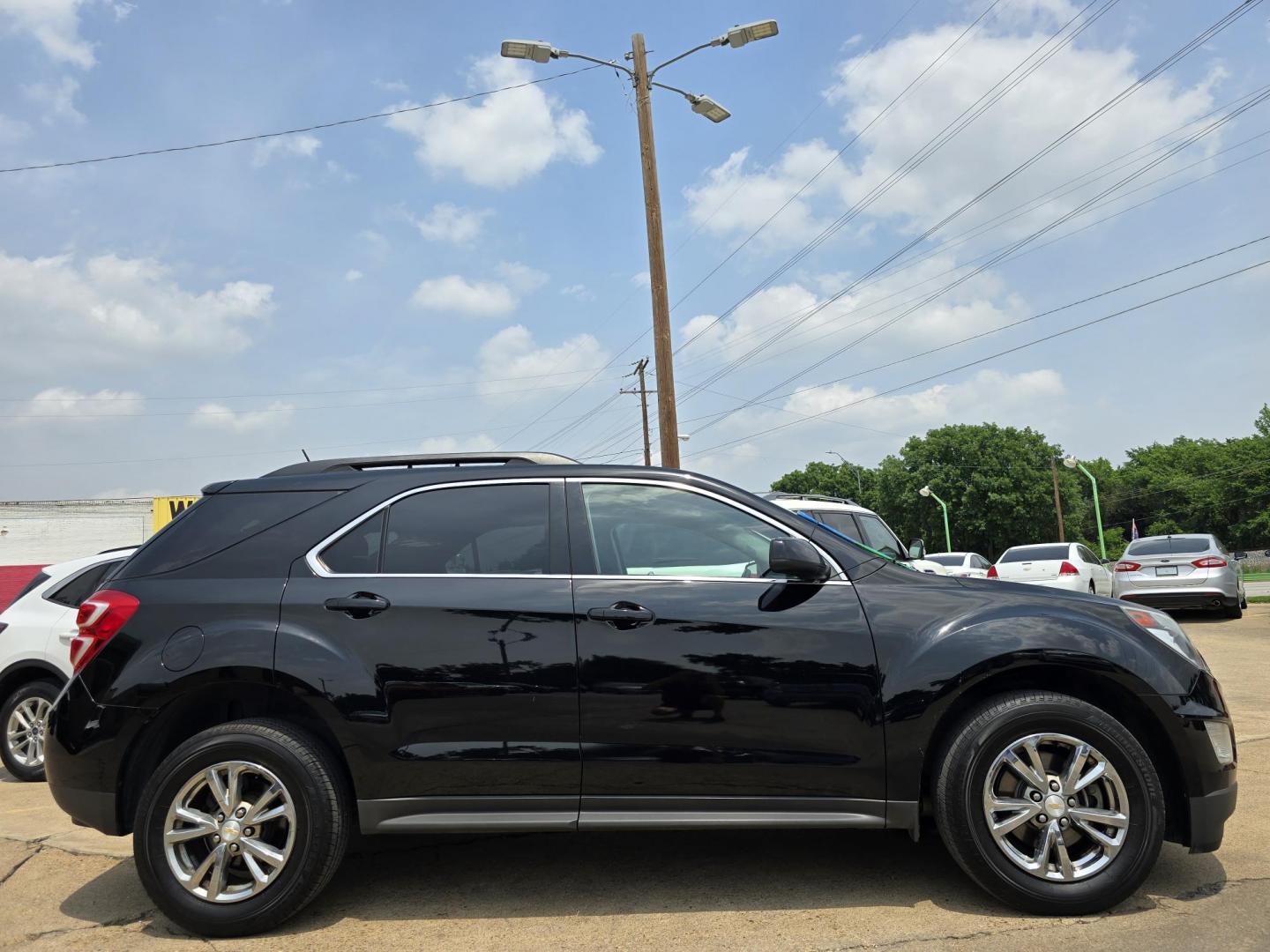 2016 BLACK Chevrolet Equinox LT (2GNALCEK6G6) with an 2.4L L4 DOHC 16V FFV engine, 6A transmission, located at 2660 S.Garland Avenue, Garland, TX, 75041, (469) 298-3118, 32.885551, -96.655602 - Photo#2