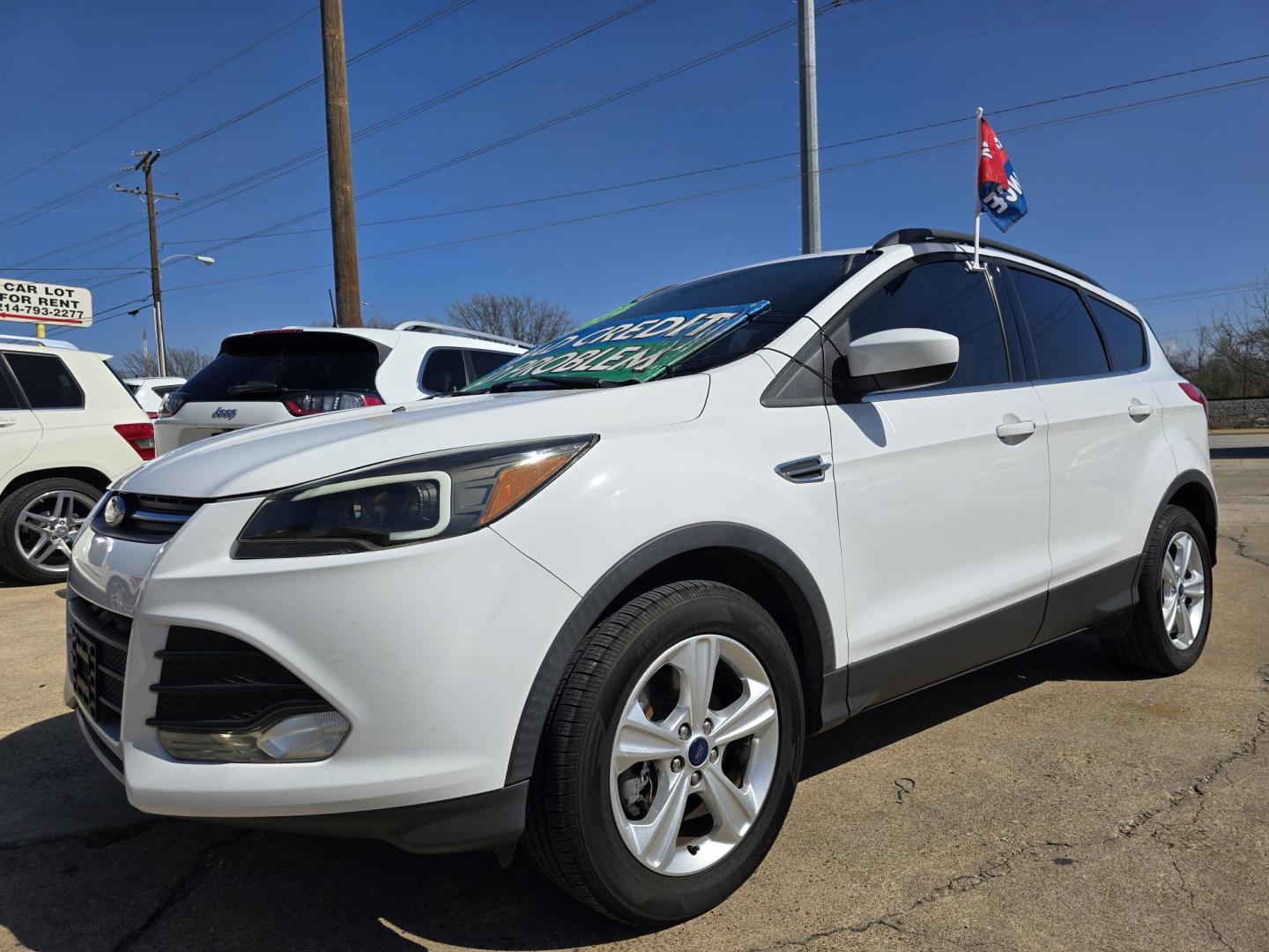 2016 WHITE Ford Escape SE (1FMCU9GX0GU) with an 1.6L L4 DOHC 16V engine, 6-Speed Automatic transmission, located at 2660 S.Garland Avenue, Garland, TX, 75041, (469) 298-3118, 32.885551, -96.655602 - Welcome to DallasAutos4Less, one of the Premier BUY HERE PAY HERE Dealers in the North Dallas Area. We specialize in financing to people with NO CREDIT or BAD CREDIT. We need proof of income, proof of residence, and a ID. Come buy your new car from us today!! This is a Super Clean 2016 FORD ESCAP - Photo#7