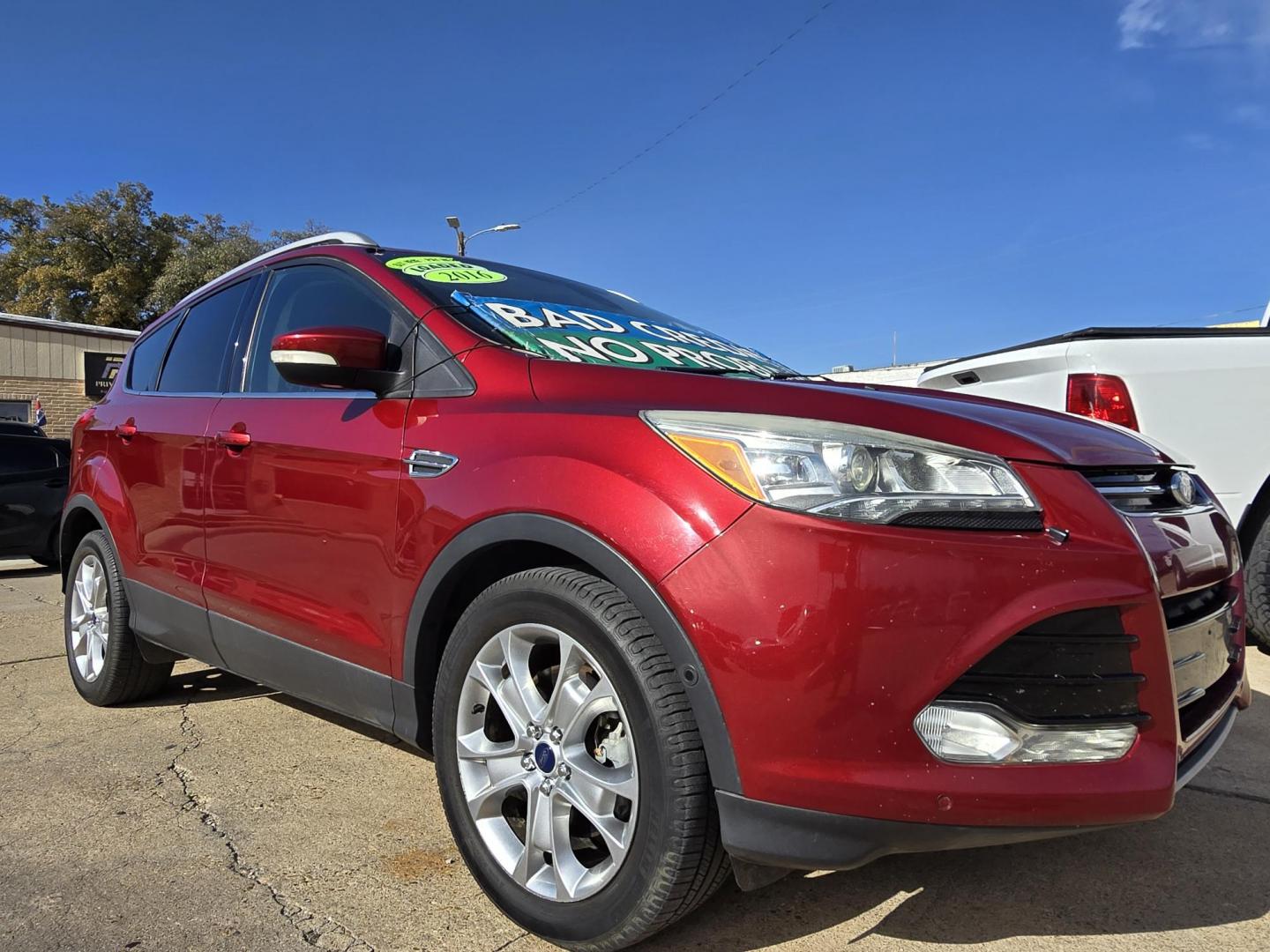 2016 RED Ford Escape Titanium (1FMCU0J96GU) with an 2.0L L4 DOHC 16V engine, 6-Speed Automatic transmission, located at 2660 S.Garland Avenue, Garland, TX, 75041, (469) 298-3118, 32.885551, -96.655602 - Photo#1